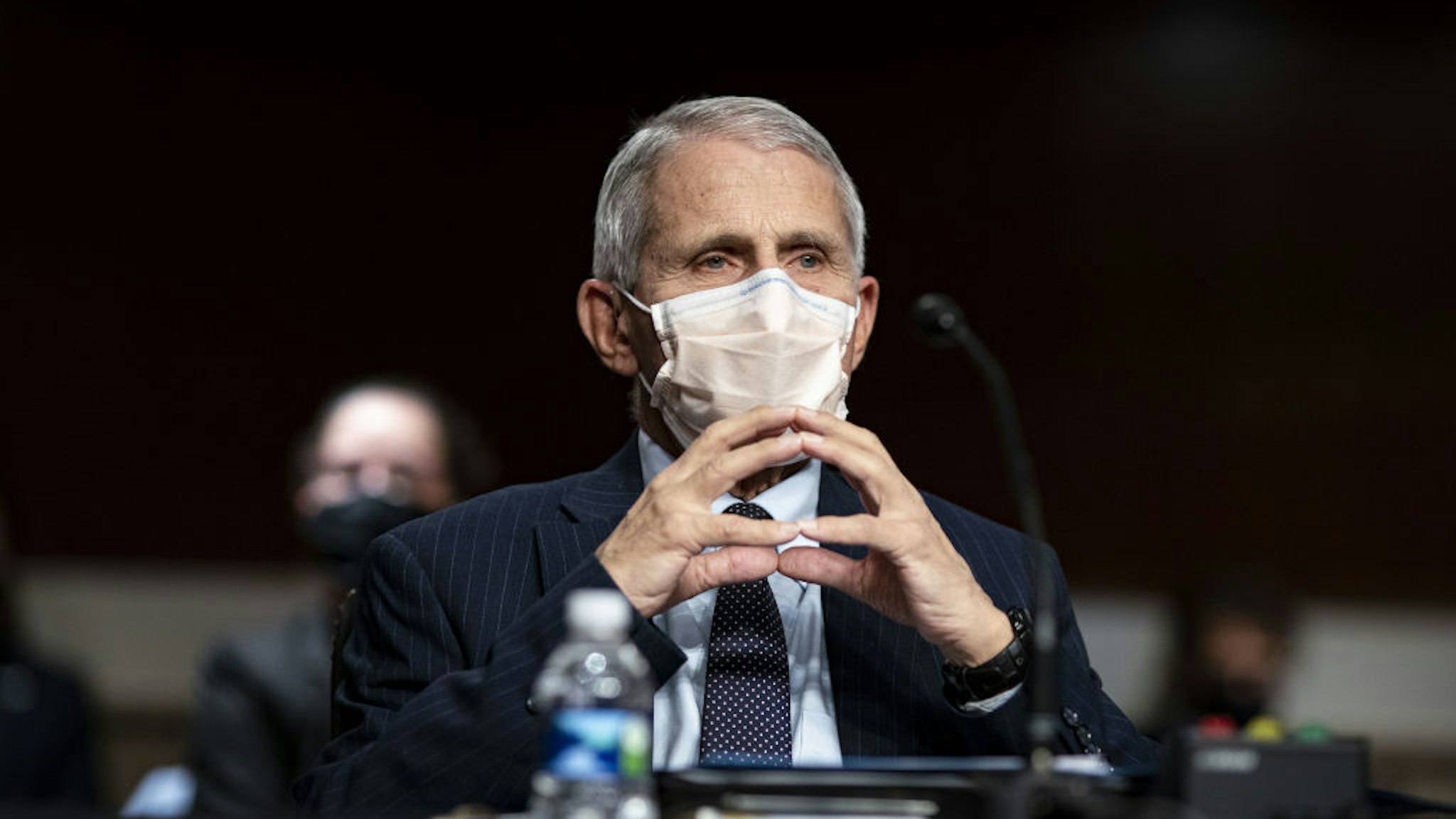 Anthony Fauci, director of the National Institute of Allergy and Infectious Diseases, listens during a Senate Health, Education, Labor, and Pensions Committee hearing in Washington, D.C., U.S., on Thursday, Nov. 4, 2021. Younger children across the U.S. are now eligible to receive Pfizer's Covid-19 vaccine, after the head of the Centers for Disease Control and Prevention this week granted the final clearance needed for shots to begin. Photographer: Al Drago/Bloomberg via Getty Images