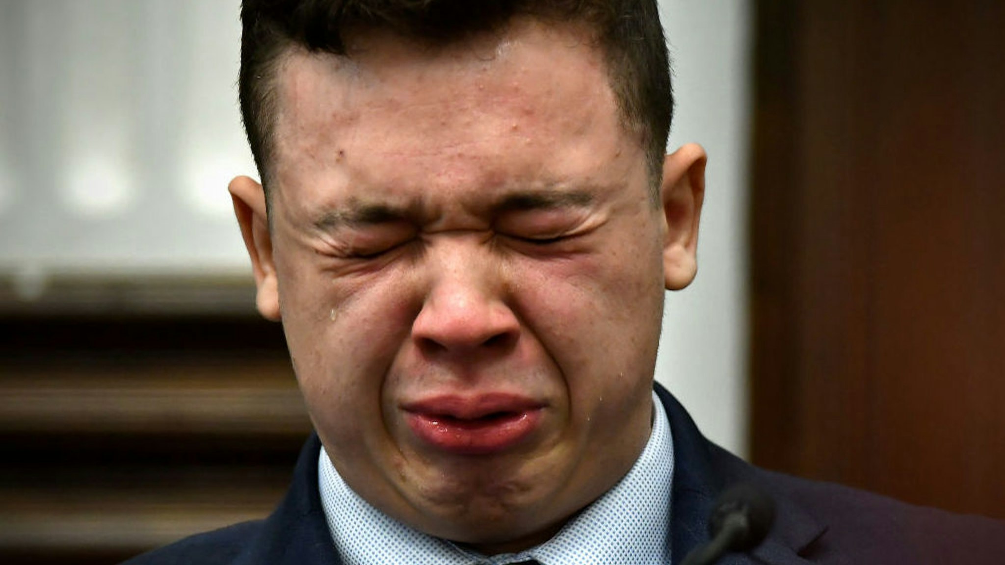 Kyle Rittenhouse breaks down on the stand as he testifies about his encounter with the late Joseph Rosenbaum during his trial at the Kenosha County Courthouse on November 10, 2021 in Kenosha, Wisconsin.
