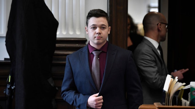 Kyle Rittenhouse enters the courtroom to hear the verdicts in his trial prior to being found not guilty on all counts at the Kenosha County Courthouse on November 19, 2021 in Kenosha, Wisconsin.