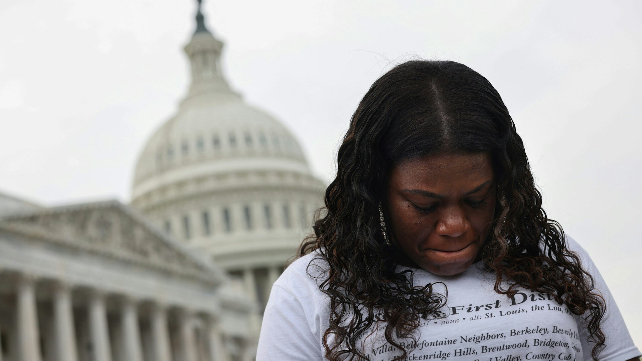 WASHINGTON, DC - AUGUST 03: U.S. Rep. Cori Bush (D-MO) becomes emotional during a news conference on the eviction moratorium at the Capitol on August 03, 2021 in Washington, DC. News organizations reported that the Biden Administration plans to institute a new eviction moratorium for areas with high levels of COVID-19, days after Bush started camping out on the steps of the Capitol Building to protest the end of the Centers for Disease Control and Prevention's original moratorium. (Photo by Kevin Dietsch/Getty Images)