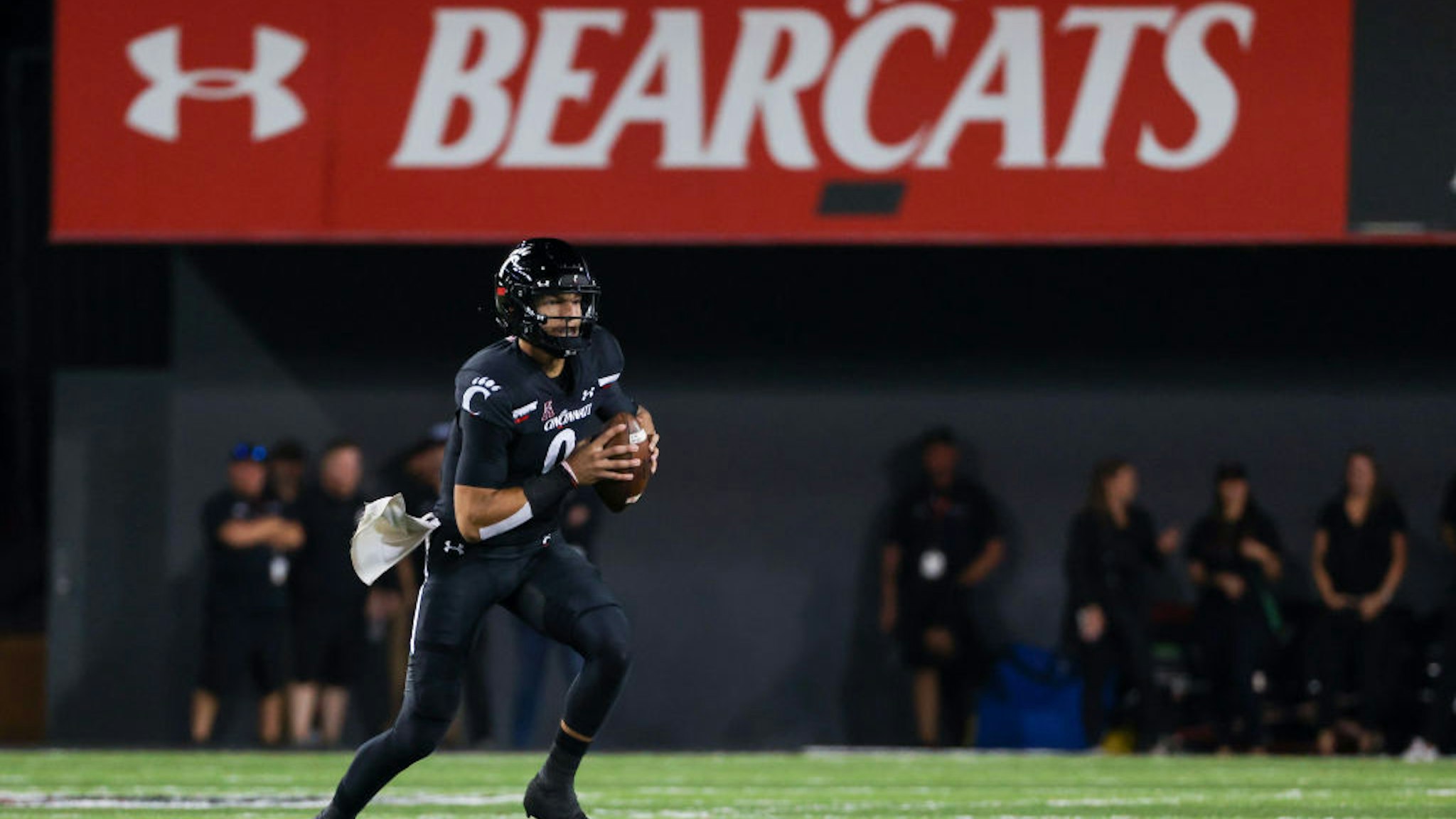 CINCINNATI, OHIO - OCTOBER 08: Desmond Ridder #9 of the Cincinnati Bearcats runs with the ball in the second quarter against the Temple Owls at Nippert Stadium on October 08, 2021 in Cincinnati, Ohio. (Photo by Dylan Buell/Getty Images)