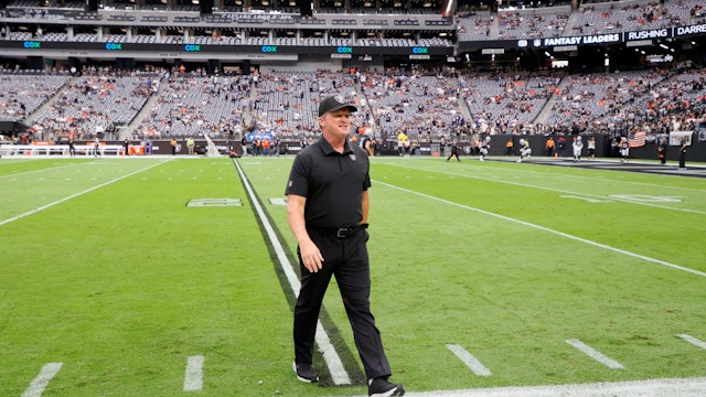 LAS VEGAS, NEVADA - OCTOBER 10: Head coach John Gruden of the Las Vegas Raiders walks on the field before a game against the Chicago Bears at Allegiant Stadium on October 10, 2021 in Las Vegas, Nevada. (Photo by Ethan Miller/Getty Images)