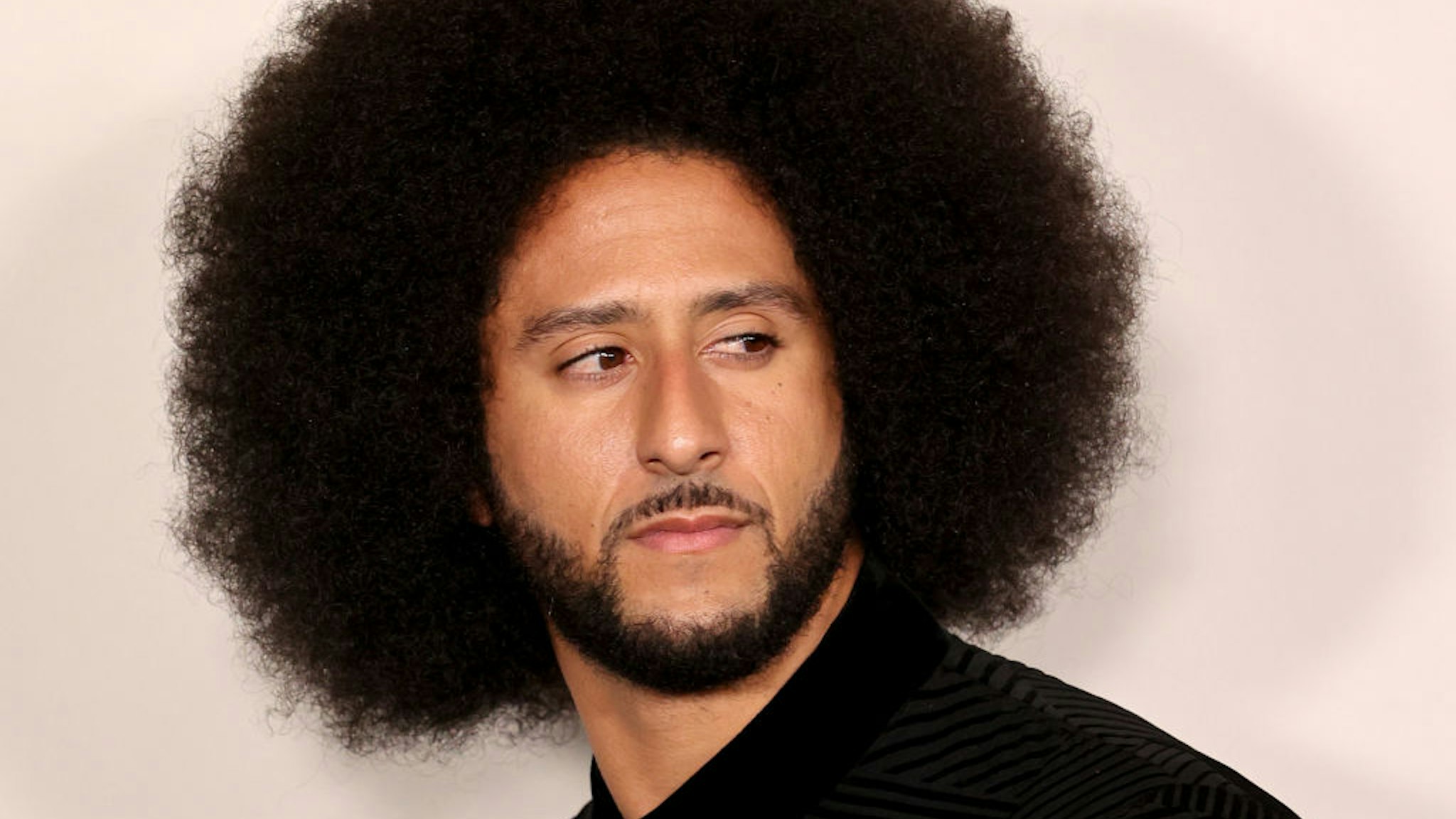 Colin Kaepernick arrives at the Los Angeles premiere of Netflix's "Colin In Black And White" at Academy Museum of Motion Pictures on October 28, 2021 in Los Angeles, California.