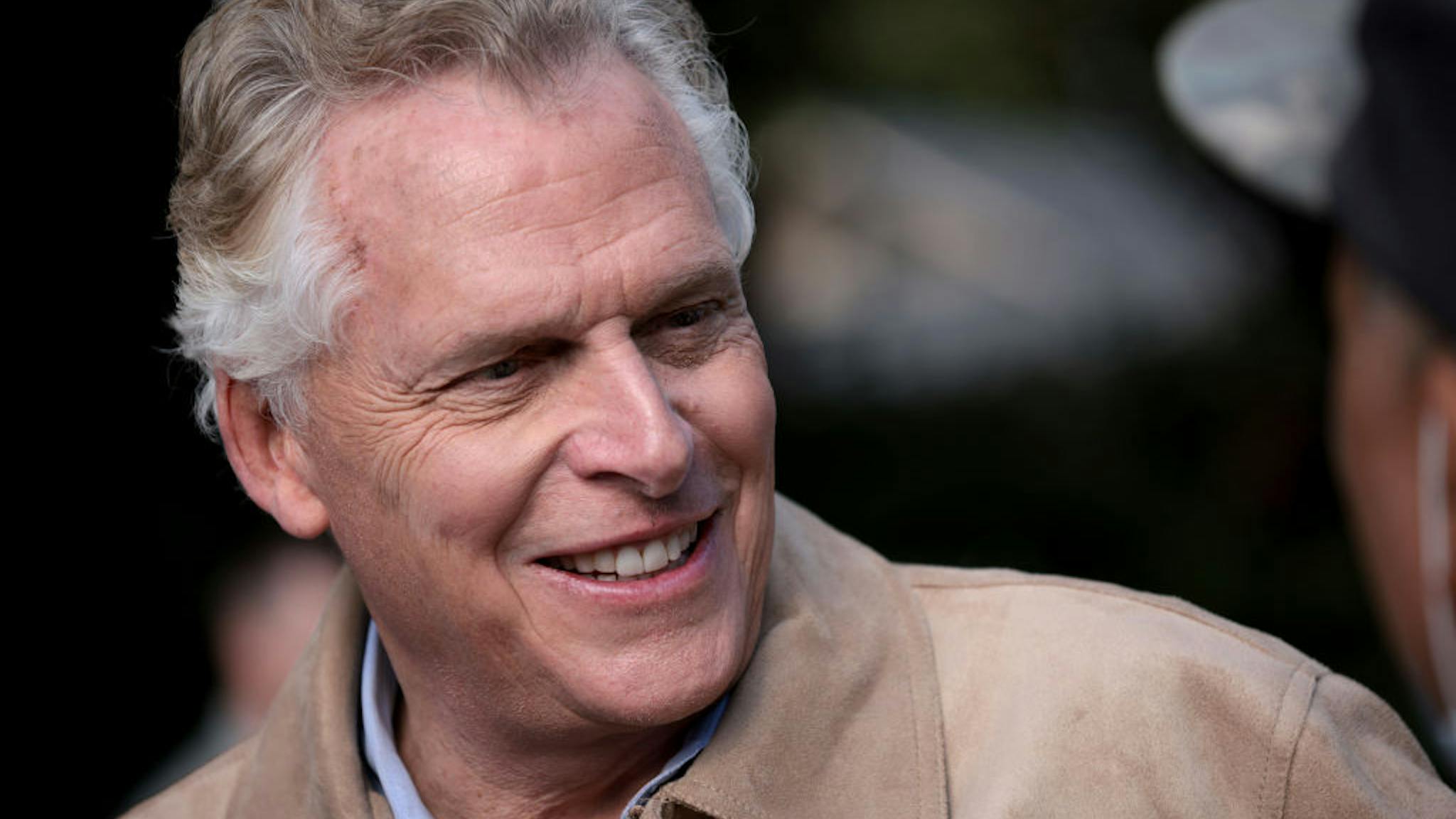 Terry McAuliffe Campaigns For Virginia Governor In Final Stretch Before Election Democratic gubernatorial candidate, former Virginia Gov. Terry McAuliffe talks with supporters after speaking at a campaign event at Sweet Donkey Coffee November 1, 2021 in Roanoke, Virginia.