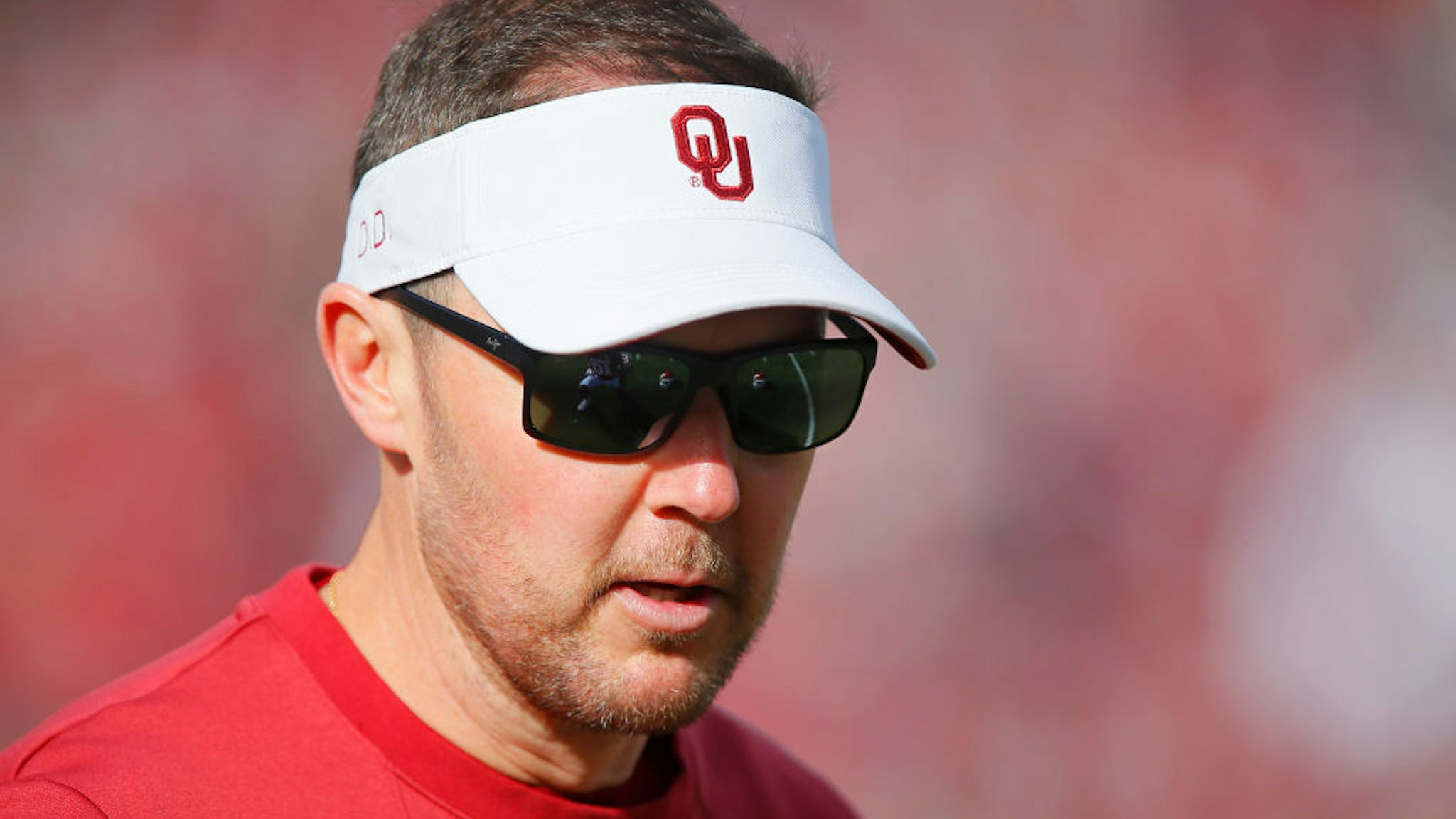 NORMAN, OK - NOVEMBER 20: Head coach Lincoln Riley of the Oklahoma Sooners greets players before a game against the Iowa State Cyclones at Gaylord Family Oklahoma Memorial Stadium on November 20, 2021 in Norman, Oklahoma. The Sooners won 28-21. (Photo by Brian Bahr/Getty Images)