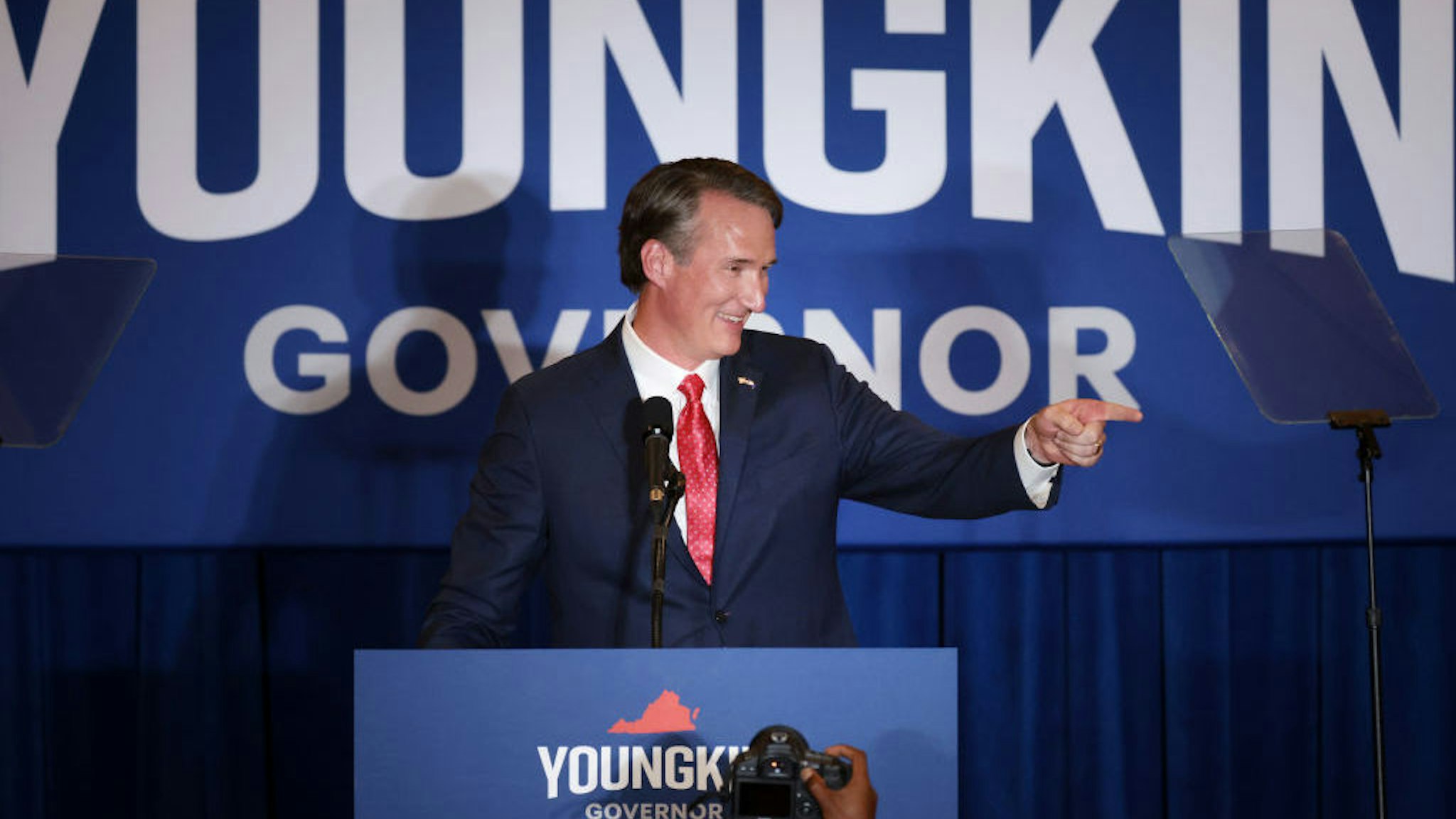 CHANTILLY, VIRGINIA - NOVEMBER 02: Virginia Republican gubernatorial candidate Glenn Youngkin takes the stage at an election-night rally at the Westfields Marriott Washington Dulles on November 02, 2021 in Chantilly, Virginia. Virginians went to the polls Tuesday to vote in the gubernatorial race that pitted Youngkin against Democratic gubernatorial candidate, former Virginia Gov. Terry McAuliffe. (Photo by Chip Somodevilla/Getty Images)