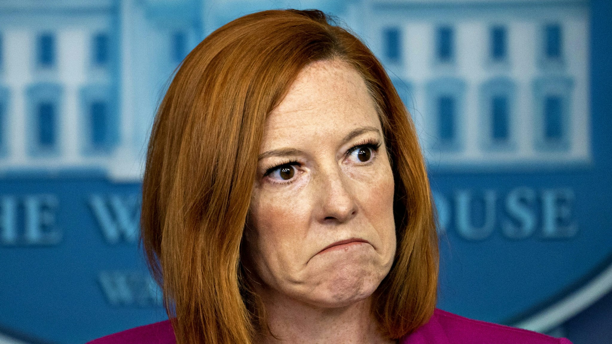 Jen Psaki, White House press secretary, pauses while speaking during a news conference in the James S. Brady Press Briefing Room at the White House in Washington, D.C., U.S., on Wednesday, Aug. 4, 2021. President Biden quelled for now a brewing confrontation with progressive Democrats with a new moratorium on evictions during the pandemic, but the order invites a legal fight with high-stakes consequences for public health.