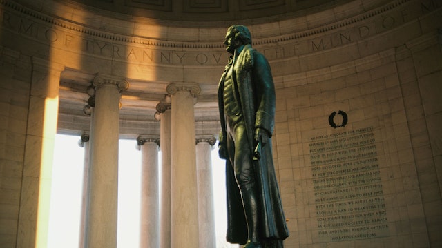 Rudulph Evans's statue of Thomas Jefferson with excerpts of the Declaration of Independence seen behind, Thomas Jefferson Memorial, Washington, D.C., USA, March 1985.