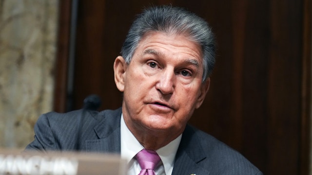 UNITED STATES - NOVEMBER 02: Chairman Joe Manchin, D-W.Va., arrives for a Senate Energy and Natural Resources Committee markup on nominations in Dirksen Building on Tuesday, November 2, 2021.
