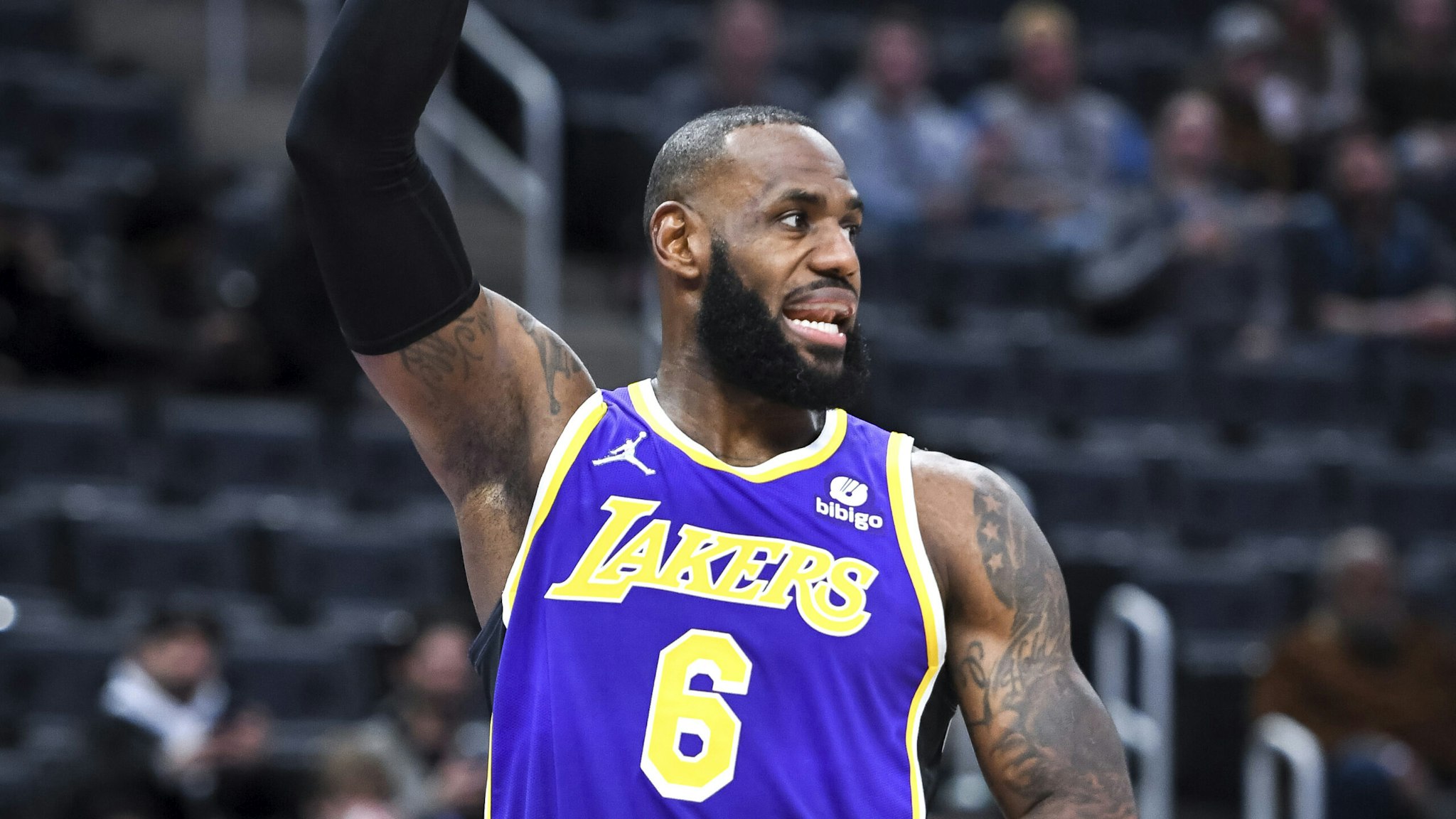 DETROIT, MICHIGAN - NOVEMBER 21: LeBron James #6 of the Los Angeles Lakers signals against the Detroit Pistons during the first quarter of the game at Little Caesars Arena on November 21, 2021 in Detroit, Michigan. NOTE TO USER: User expressly acknowledges and agrees that, by downloading and or using this photograph, User is consenting to the terms and conditions of the Getty Images License Agreement.