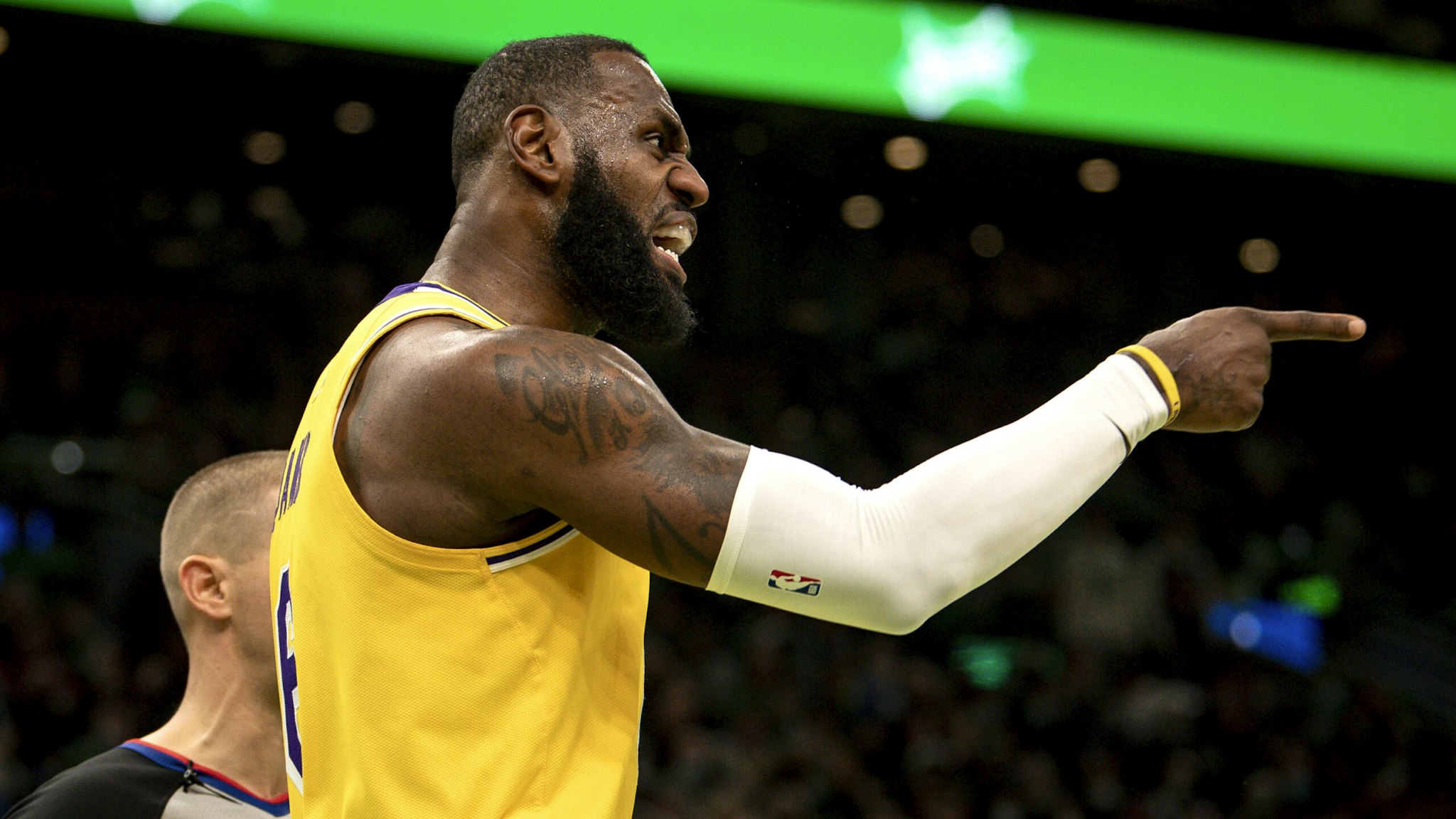 BOSTON, MASSACHUSETTS - NOVEMBER 19: LeBron James #6 of the Los Angeles Lakers reacts after scoring during the first half against the Boston Celtics at TD Garden on November 19, 2021 in Boston, Massachusetts. NOTE TO USER: User expressly acknowledges and agrees that, by downloading and or using this photograph, User is consenting to the terms and conditions of the Getty Images License Agreement.