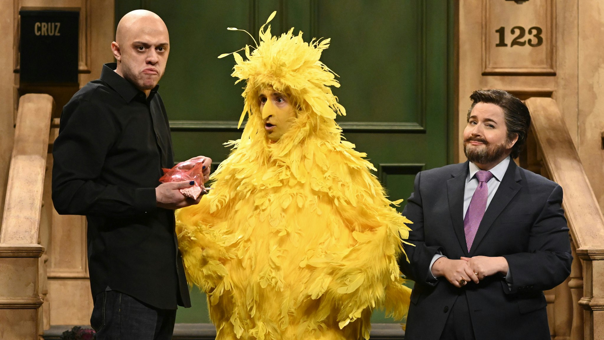 SATURDAY NIGHT LIVE -- "Jonathan Majors" Episode 1811 -- Pictured: (l-r) Pete Davidson as Joe Rogan, Kyle Mooney as Big Bird, Aidy Bryant as Ted Cruz, and Andrew Dismukes during the "Ted Cruz Sesame Street" Cold Open on Saturday, November 13, 2021 --