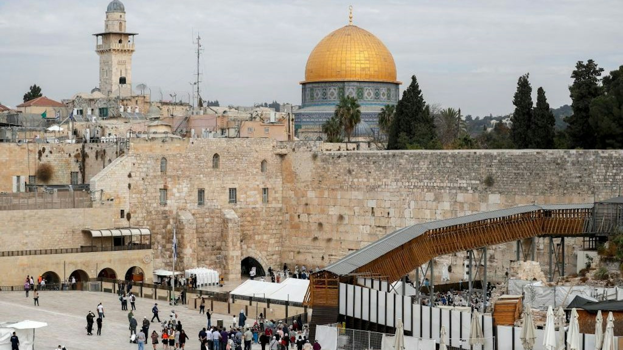 This picture shows the Mughrabi ramp, leading from the Western Wall (Wailing Wall) to the Al-Aqsa Mosque compound that includes the Dome of the Rock Mosque (background) in Jerusalem's Old City, on November 17, 2021. (Photo by AHMAD GHARABLI / AFP) (Photo by AHMAD GHARABLI/AFP via Getty Images)