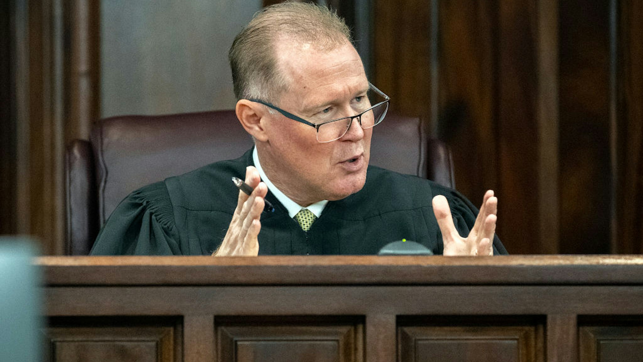 BRUNSWICK, GEORGIA - NOVEMBER 24: Superior Court Judge Timothy Walmsley clarifies a jury request to view a short video clip as part of their deliberation during the trial of McMichel and his son, Travis McMichael, and a neighbor, William "Roddie" Bryan in the Glynn County Courthouse on November 24, 2021 in Brunswick, Georgia. Greg McMichael, his son Travis McMichael, and a neighbor, William "Roddie" Bryan are charged with the February, 2020 fatal shooting of 25-year-old Ahmaud Arbery. (