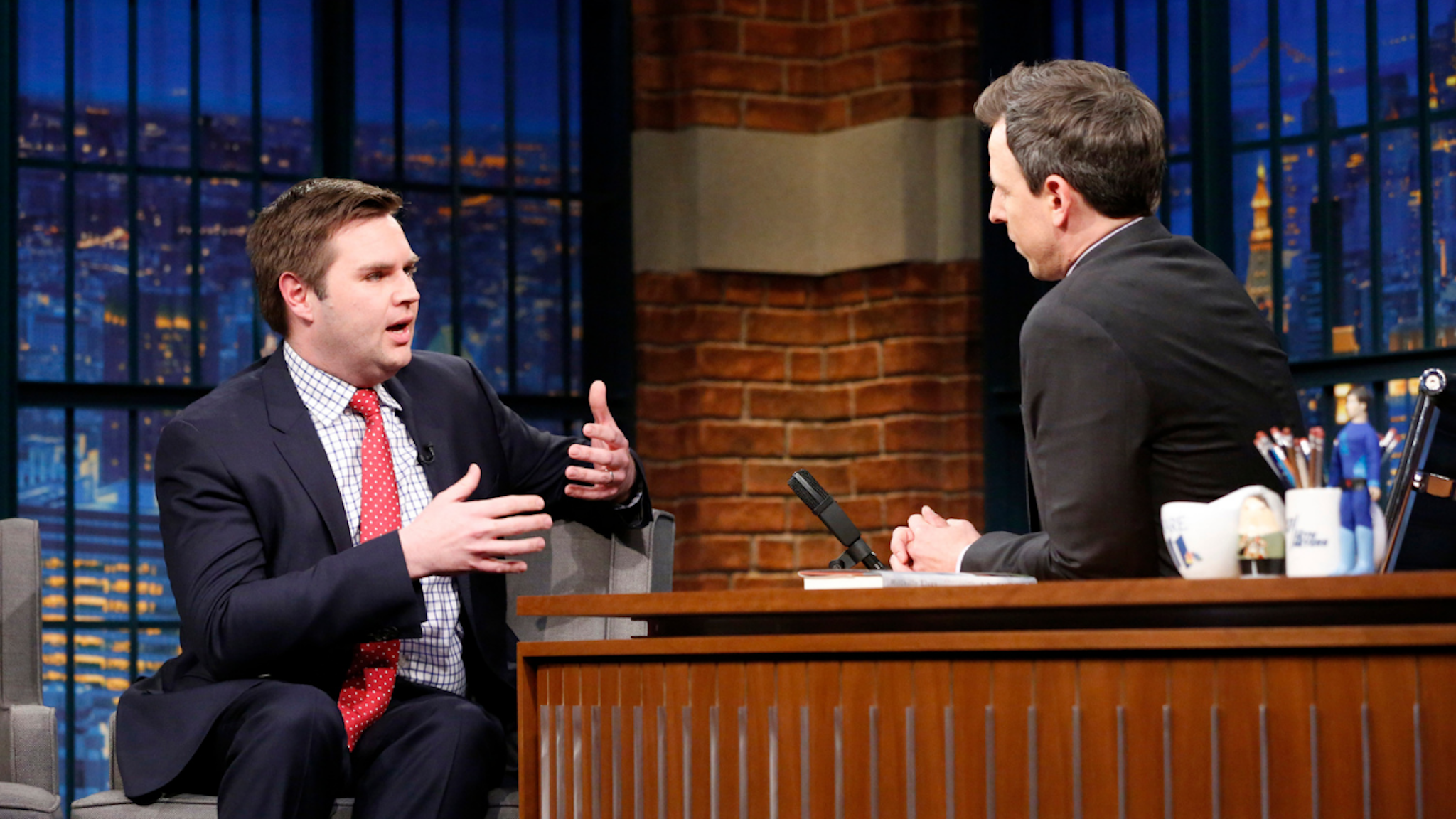 Episode 502 -- Pictured: (l-r) Author J.D. Vance during an interview with host Seth Meyers on March 15, 2017 --