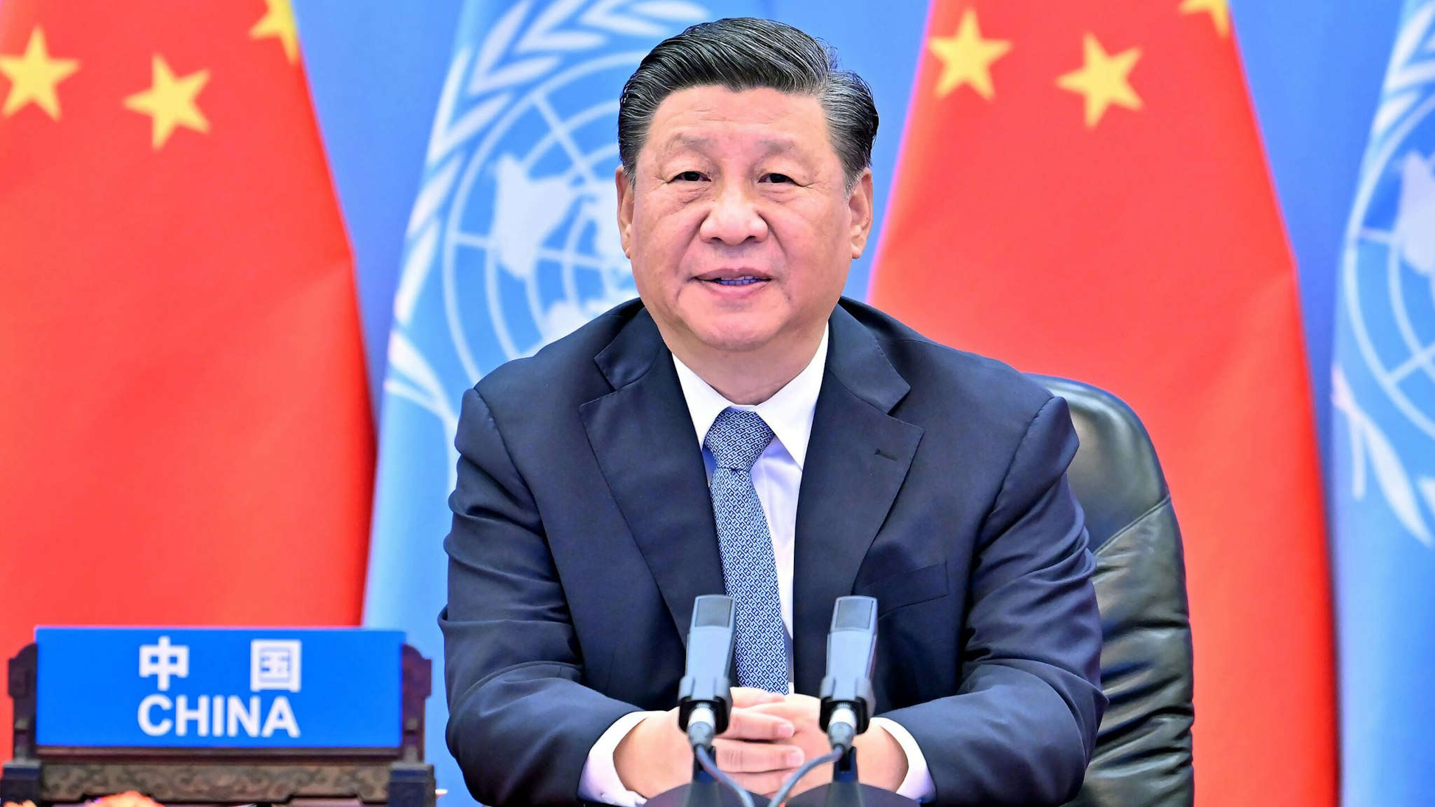 Chinese President Xi Jinping delivers a keynote speech via video link at the opening ceremony of the Second United Nations Global Sustainable Transport Conference, Oct. 14, 2021.