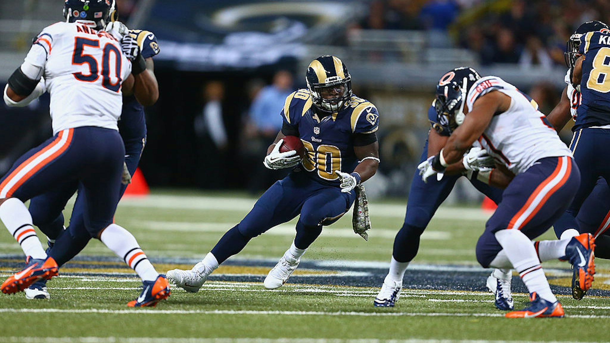 ST. LOUIS, MO - NOVEMBER 24: Zac Stacy #30 of the St. Louis Rams runs against the Chicago Bears at the Edward Jones Dome on November 24, 2013 in St. Louis, Missouri.