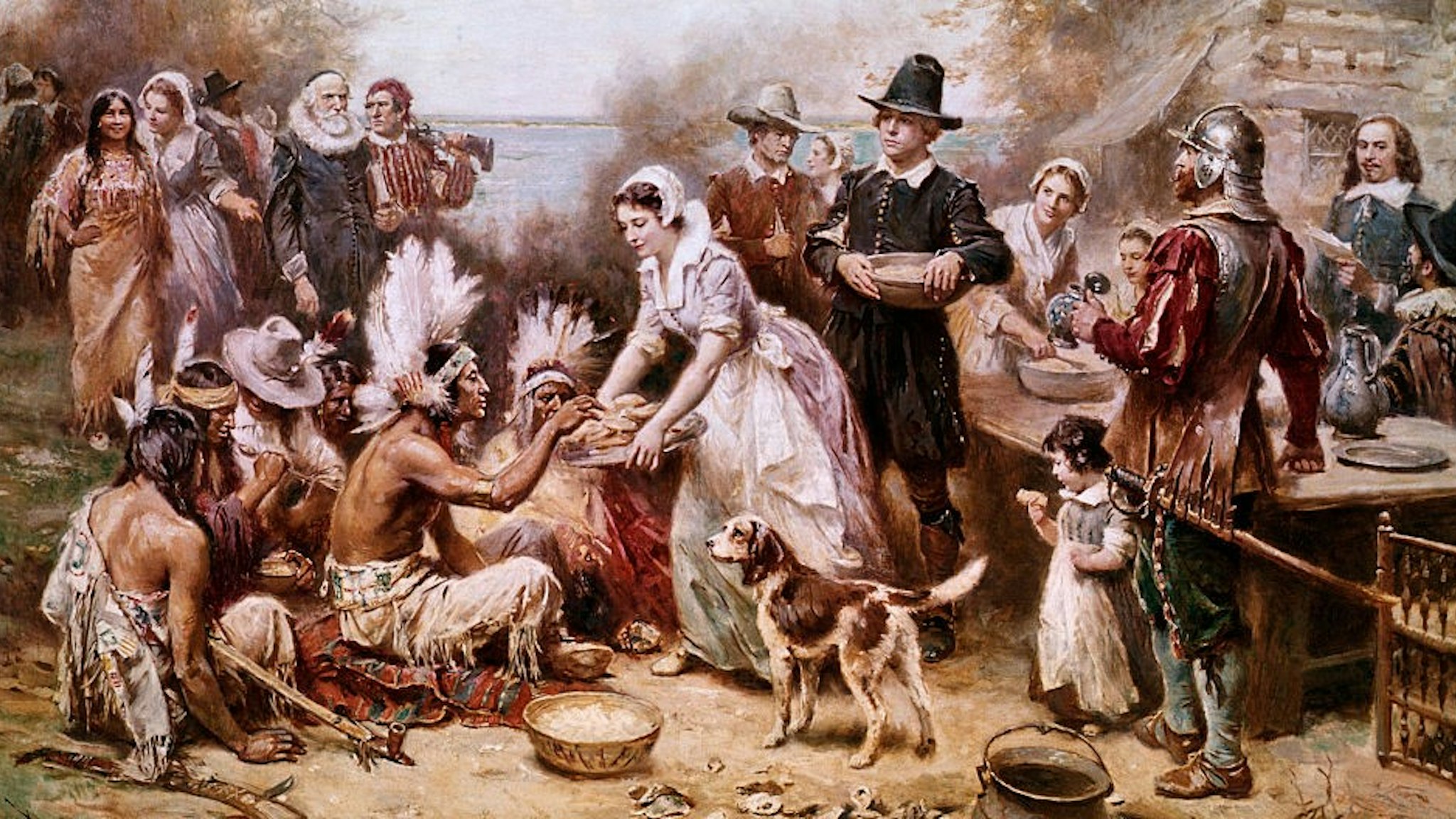 (Original Caption) Painting by J.L.M. Ferris of the first Thanksgiving ceremony with Native Americans and the Pilgrims in 1621. Undated illustration.
