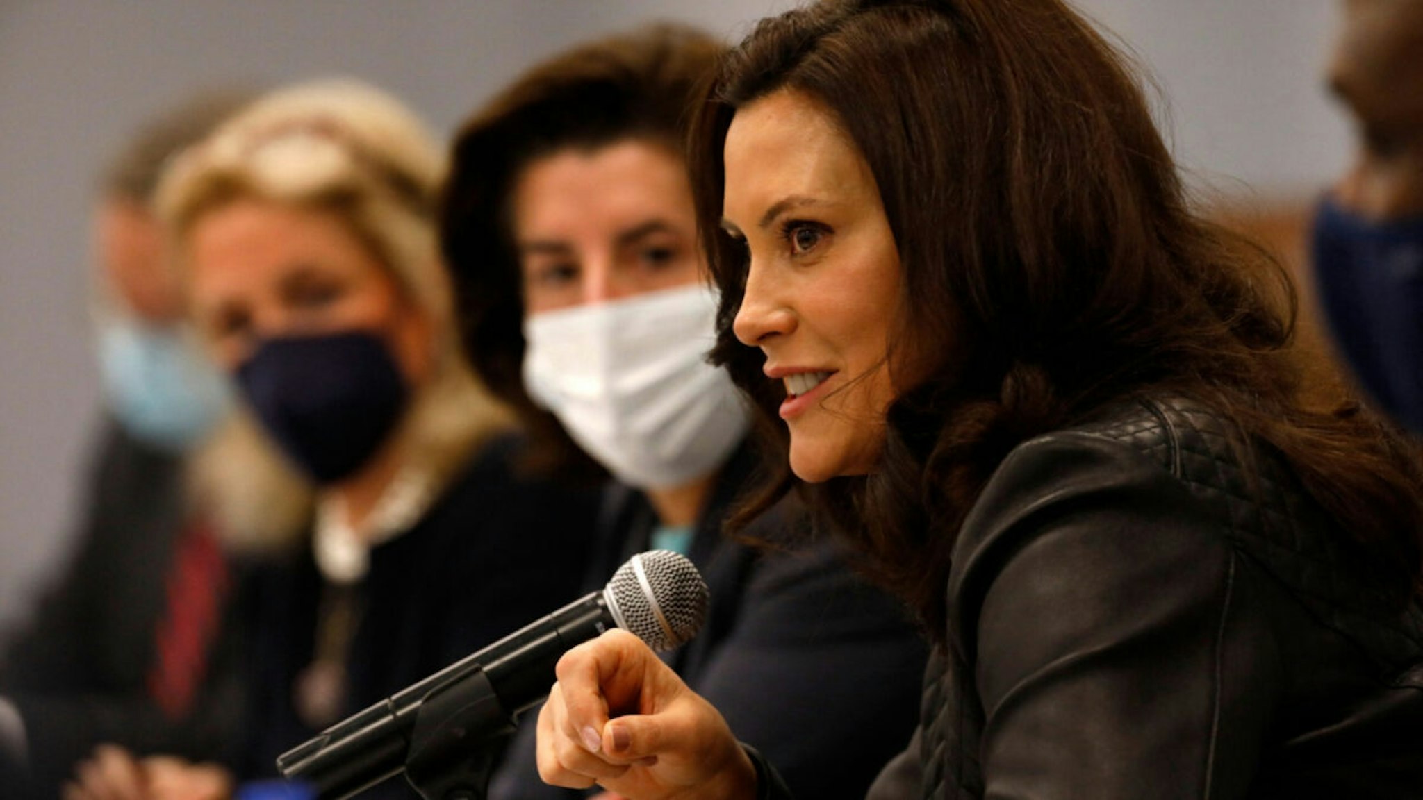 Michigan Governor Gretchen Whitmer speaks at a roundtable with US Commerce Secretary Gina Raimondo to discuss the impact of the semiconductor chip shortage at UAW Region 1A office in Taylor, Michigan on November 29, 2021.