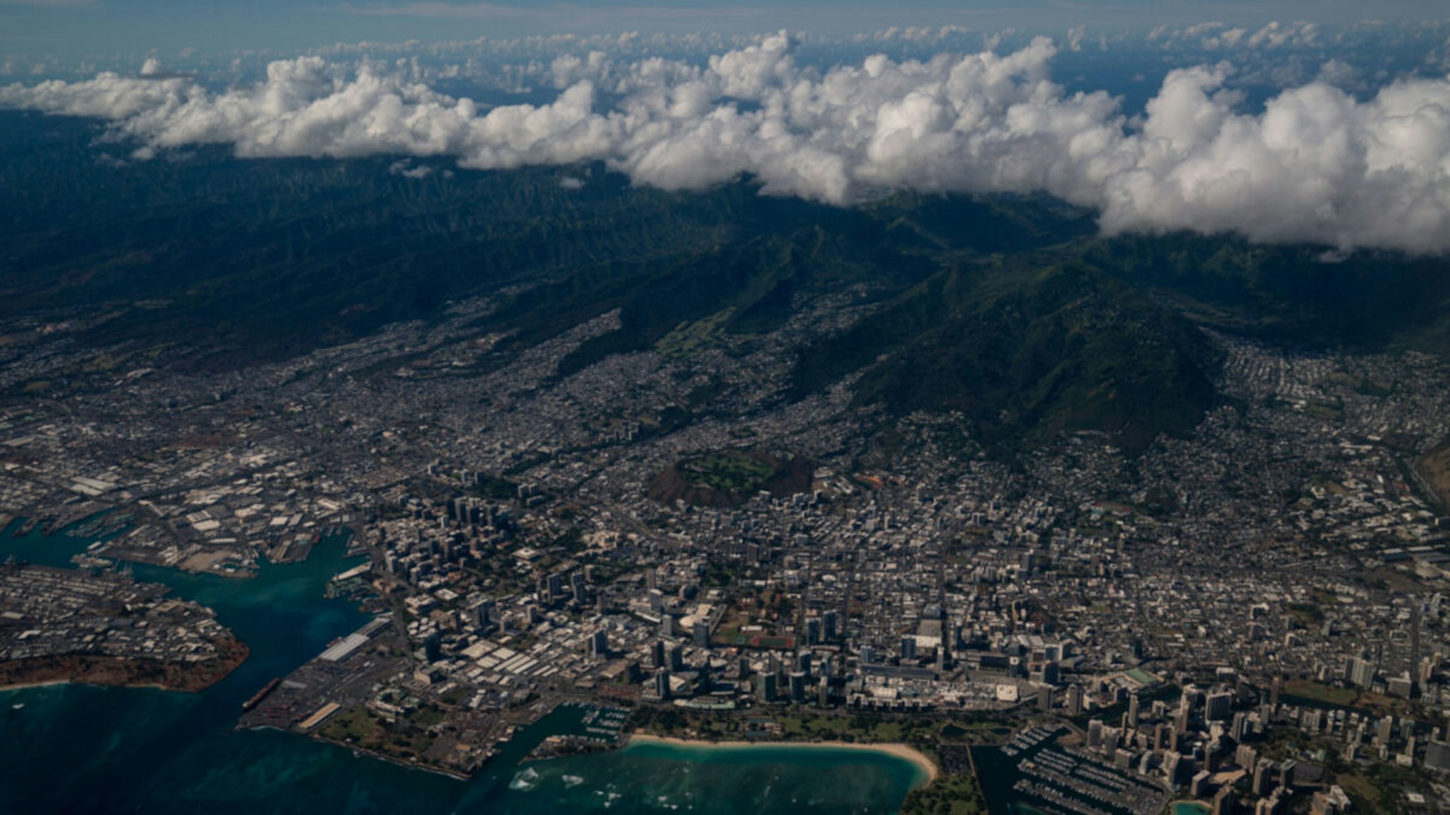 An aerial view of Ala Moana Beach Pack and Honolulu from a United Airlines flight out of Los Angeles International Airport flying over the island of Oahu on approach to Daniel K. Inouye International Airport on Wednesday, June 23, 2021 in Honolulu, HI.