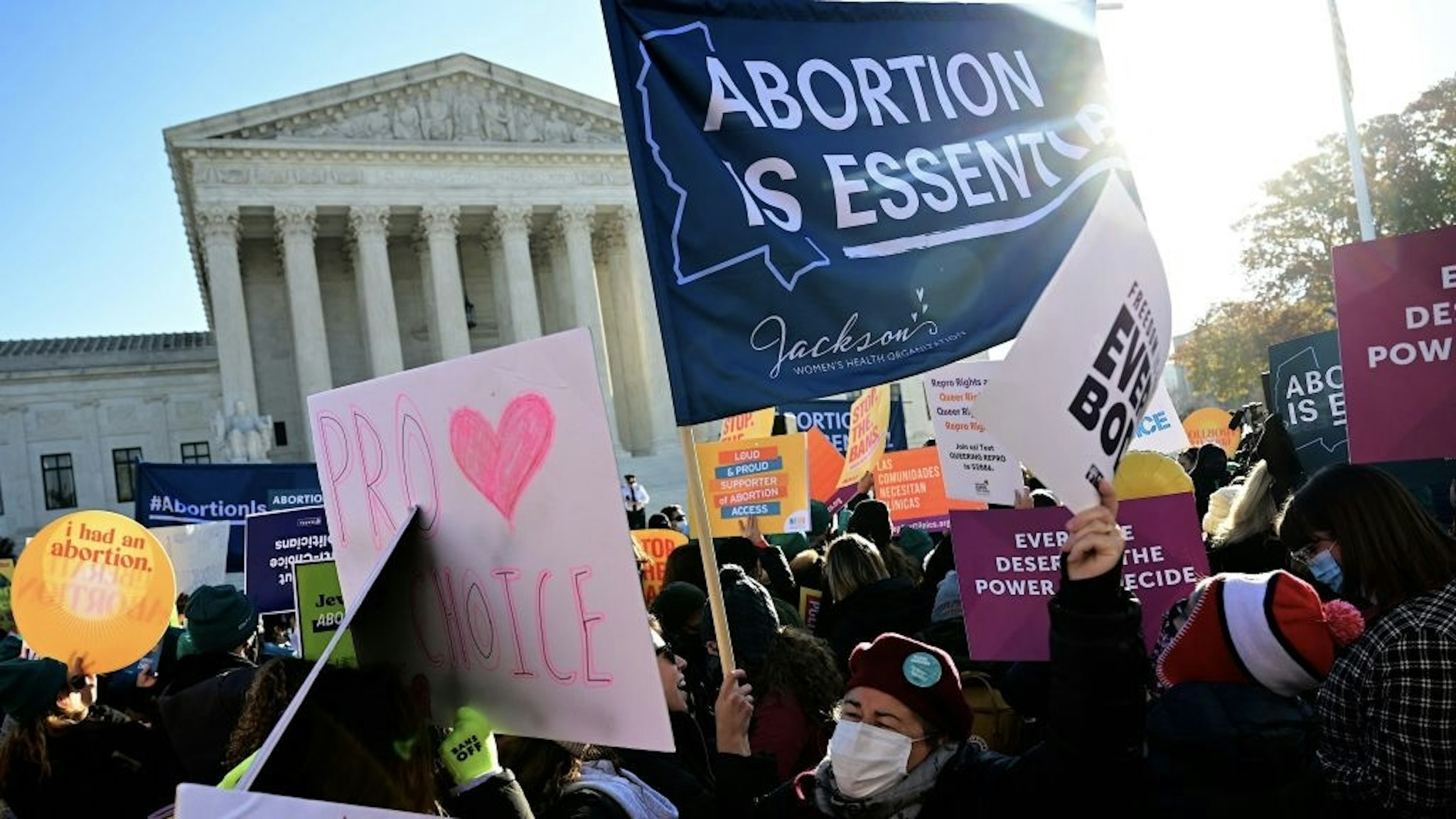 US-rights-abortion-politics-health Abortion rights advocates and anti-abortion protesters demonstrate in front of the US Supreme Court in Washington, DC, on December 1, 2021. - The justices weigh whether to uphold a Mississippi law that bans abortion after 15 weeks and overrule the 1973 Roe v. Wade decision. (Photo by Jim WATSON / AFP) (Photo by JIM WATSON/AFP via Getty Images) JIM WATSON / Contributor