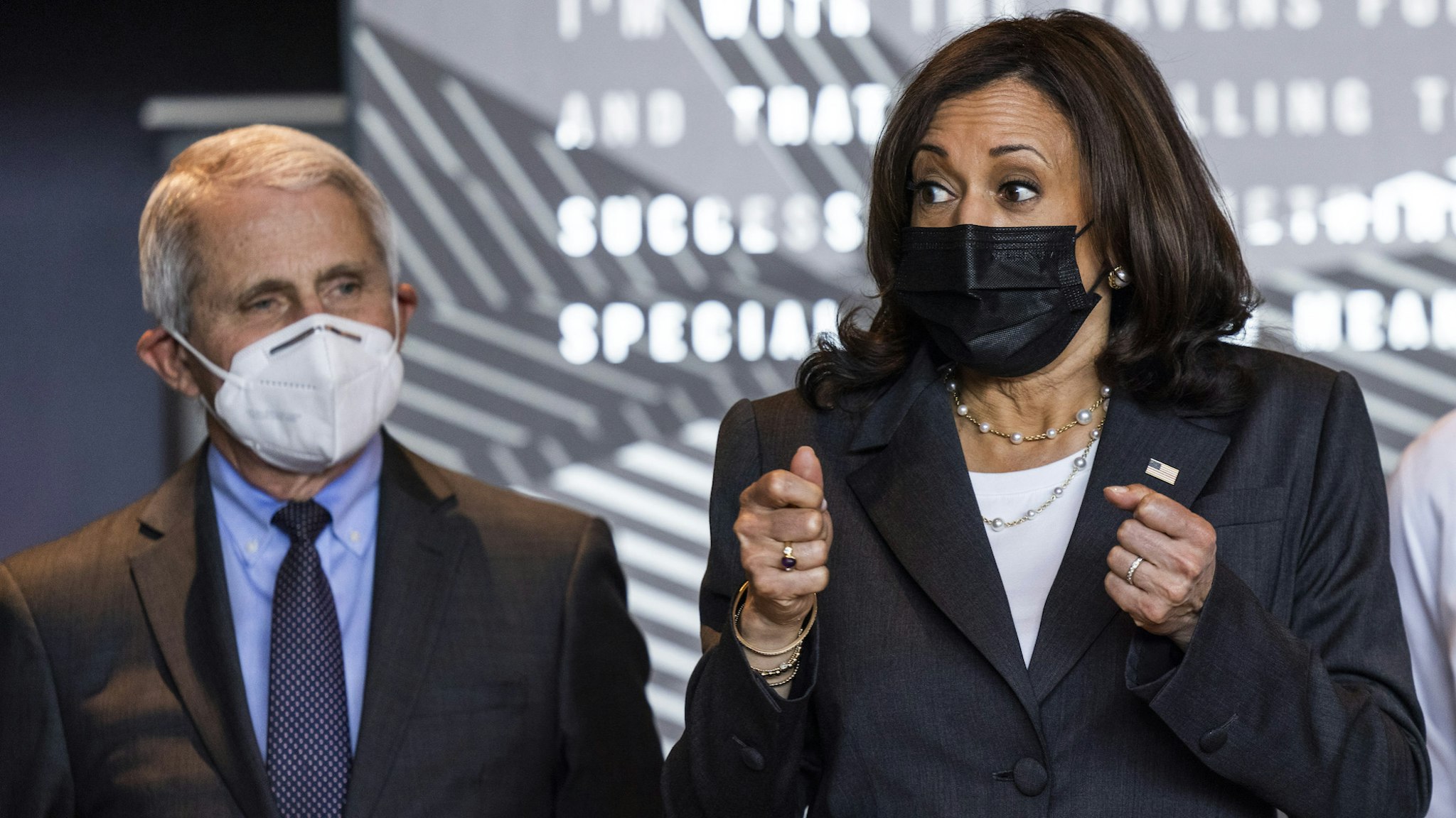 U.S. Vice President Kamala Harris, center, speaks alongside Anthony Fauci, director of the National Institute of Allergy and Infectious Diseases, and Dr. Jason Marx, right, during a tour a Covid-19 vaccination site at M&T Bank Stadium in Baltimore, Maryland, U.S., on Thursday, April 29, 2021.