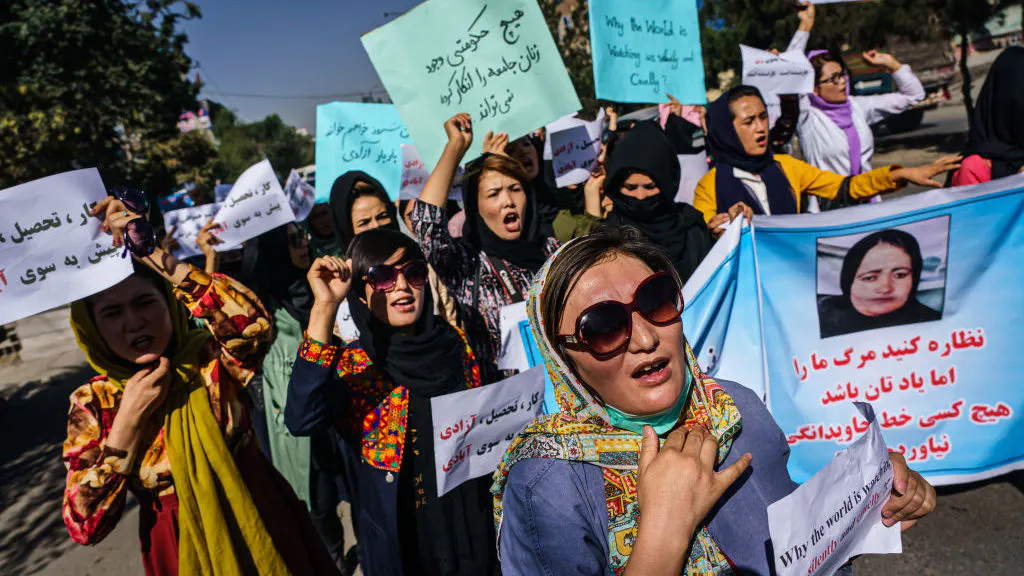 Afghan Women Protest Taliban Slayings Of U.S. Allies, Ex-Afghan Soldiers