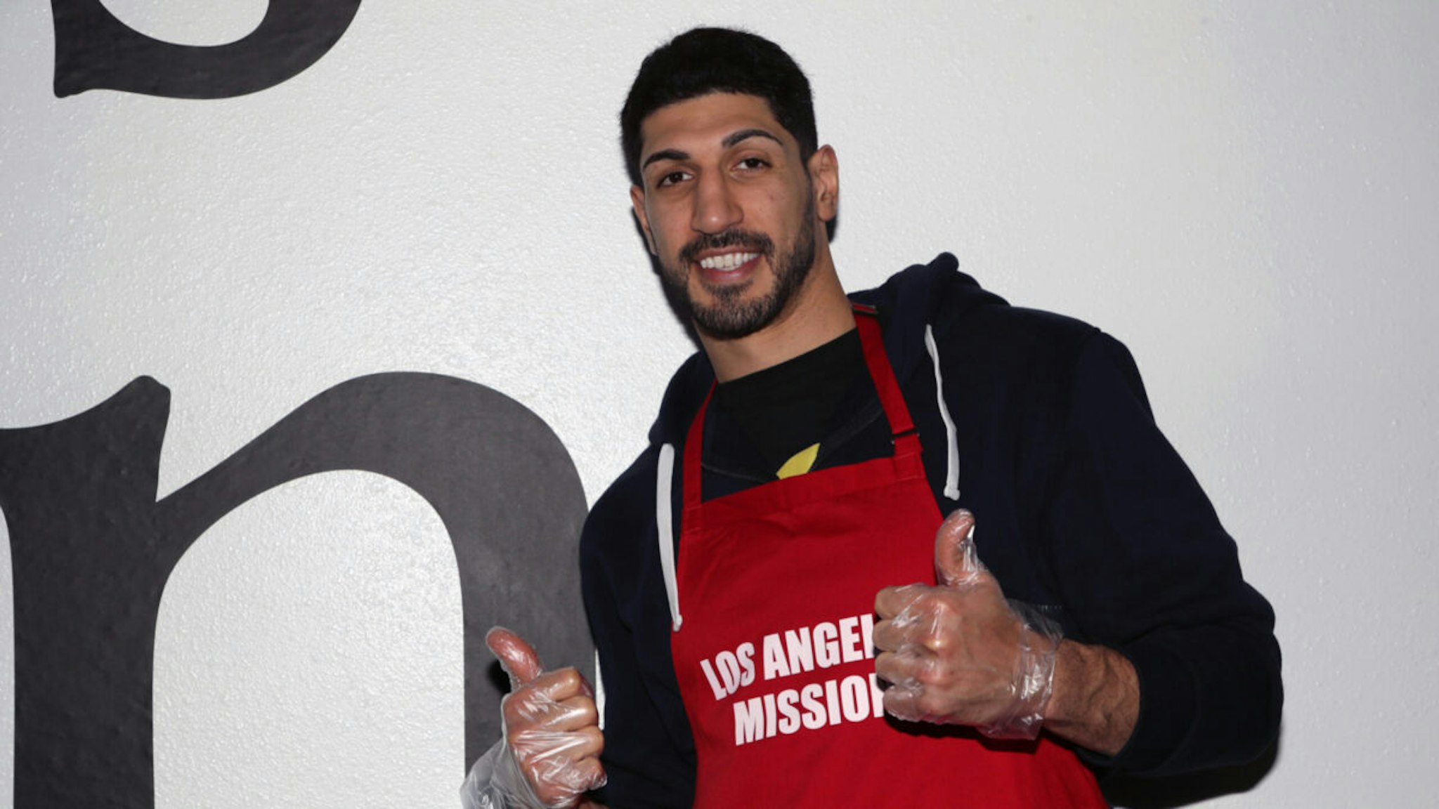 Boston Celtic and political activist Enes Kanter Freedom purchases and distributes 1000 meals from Plant Culture Cafe for the homeless at Los Angeles Mission on December 08, 2021 in Los Angeles, California.
