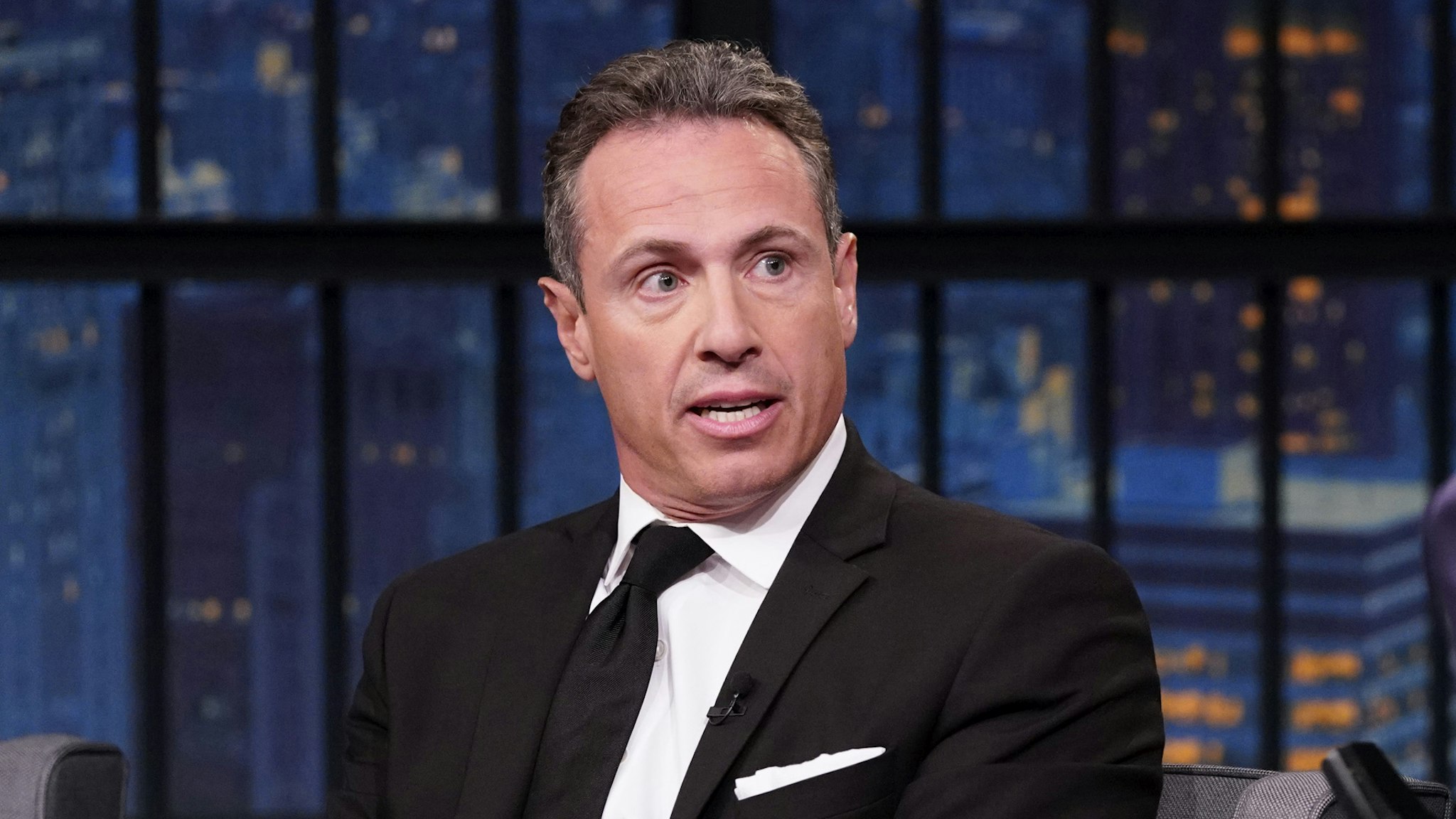 LATE NIGHT WITH SETH MEYERS -- Episode 867 -- Pictured: (l-r) CNN's Chris Cuomo during an interview with host Seth Meyers on August 1, 2019