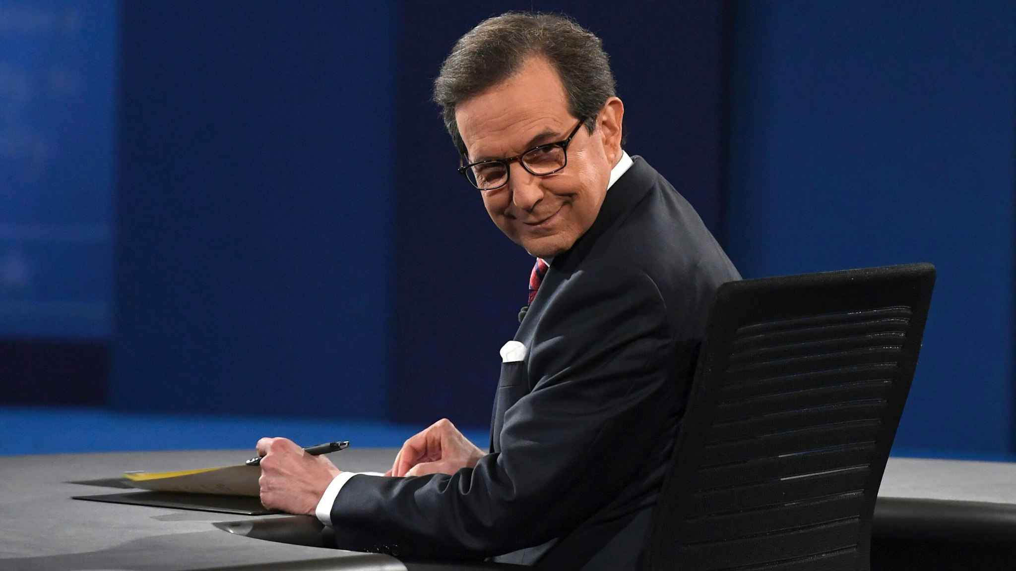Debate moderator Chris Wallace looks on prior to the third and final US presidential debate between Democratic nominee Hillary Clinton and Republican nominee Donald Trump at the Thomas &amp; Mack Center on the campus of the University of Las Vegas in Las Vegas, Nevada on October 19, 2016.