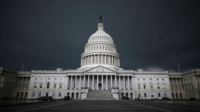 Storm clouds fill the sky over the U.S. Capitol Building, June 13, 2013 in Washington, DC.