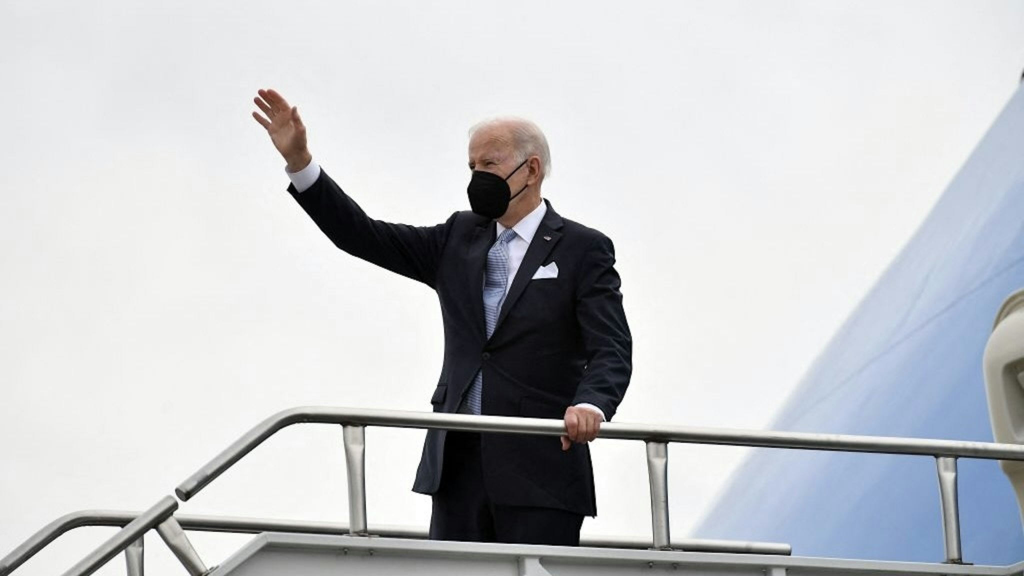 US-POLITICS-BIDEN US President Joe Biden waves as he boards Air Force One at Columbia Metropolitan Airport in West Columbia, South Carolina, on December 17, 2021. - President Biden is traveling to Wilmington, Delaware. (Photo by MANDEL NGAN / AFP) (Photo by MANDEL NGAN/AFP via Getty Images) MANDEL NGAN / Contributor