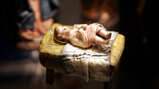 A scuplture of a baby Jesus that is part of a nativity scene from Spain is displayed during a "Joy to the World" exhibit December 9, 2004 in Washington, DC.