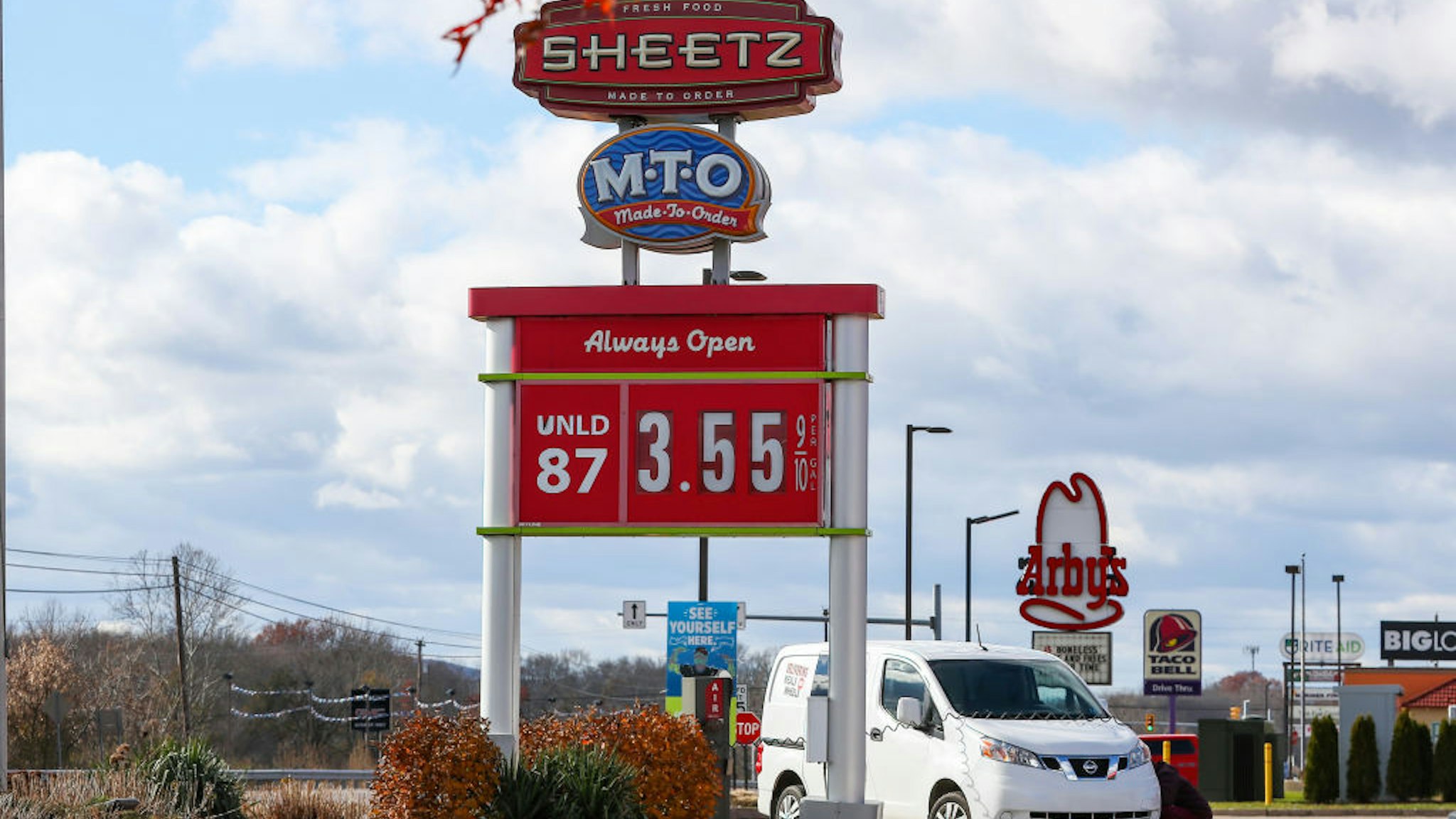 BLOOMSBURG, PENNSYLVANIA, UNITED STATES - 2021/11/23: A price stand at a Sheetz convenience store displays the price of regular unleaded gasoline. Gasoline prices in the United States remain high going into the holiday season. Gasoline prices in the United States remain high as the holiday season is approaching.