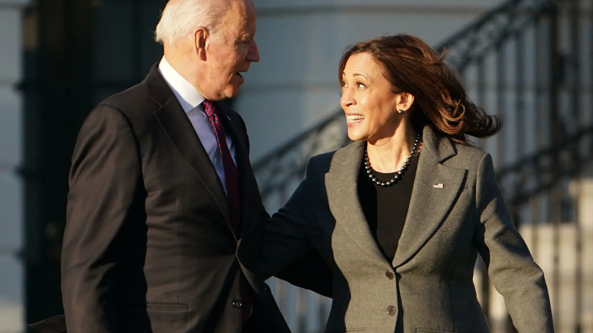 TOPSHOT-US-POLITICS-BIDEN-INFRASTRUCTURE-SIGNING US President Joe Biden (L) and US Vice President Kamala Harris arrive during a signing ceremony for H.R. 3684, the Infrastructure Investment and Jobs Act on the South Lawn of the White House in Washington, DC on November 15, 2021.