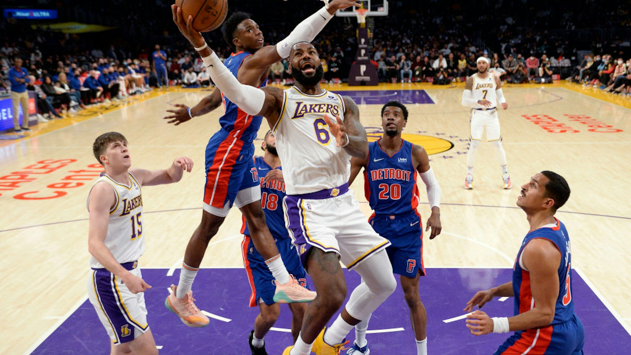 LOS ANGELES, CA - NOVEMBER 28: LeBron James #6 of the Los Angeles Lakers drives to the basket ahead of Hamidou Diallo #6 of the Detroit Pistons during the first half at Staples Center on November 28, 2021 in Los Angeles, California. NOTE TO USER: User expressly acknowledges and agrees that, by downloading and/or using this Photograph, user is consenting to the terms and conditions of the Getty Images License Agreement.(Photo by Kevork Djansezian/Getty Images)