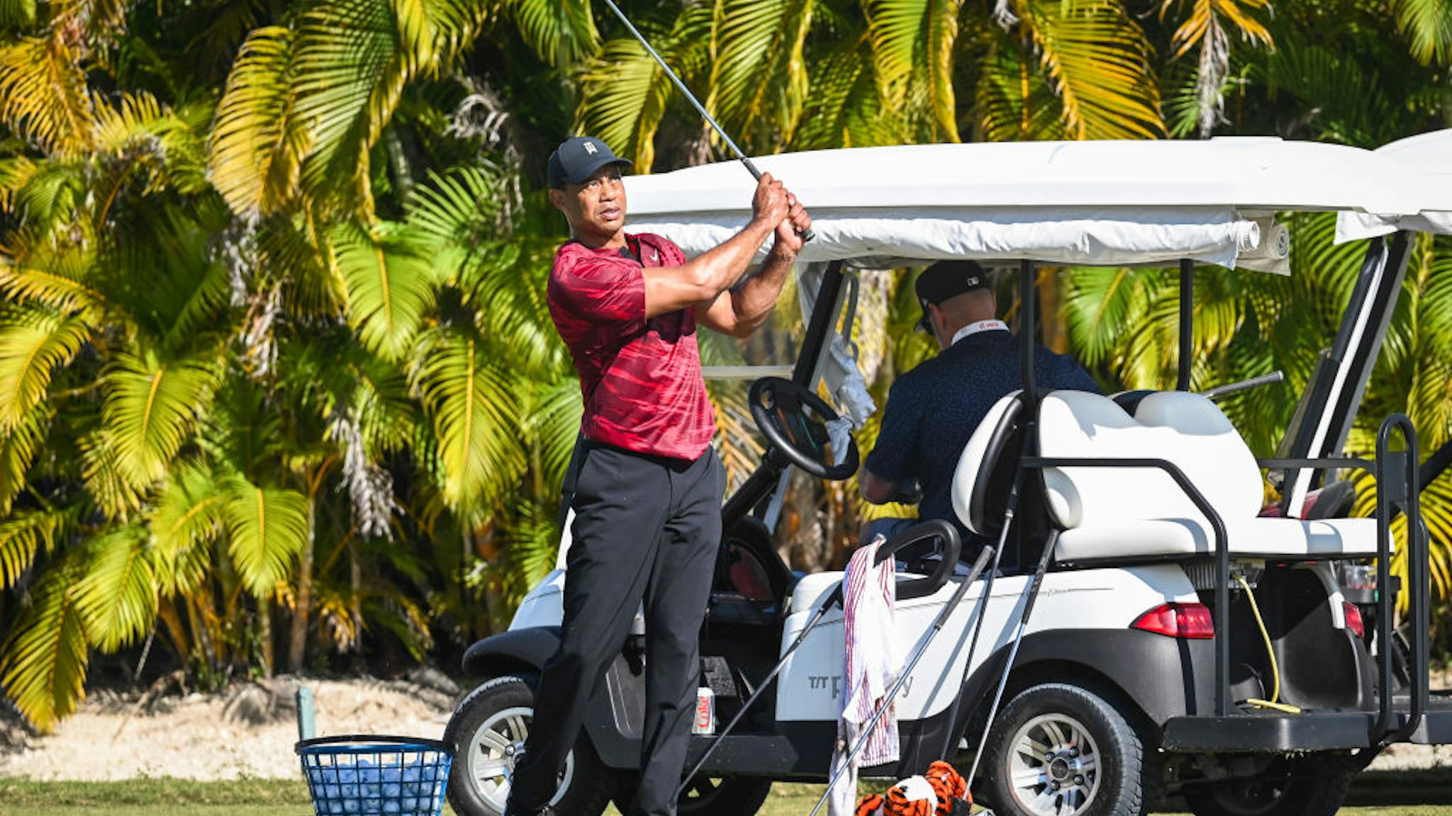 NASSAU, BAHAMAS - DECEMBER 05: Tournament host Tiger Woods hits wedges on the practice range during the final round of the Hero World Challenge at Albany on December 5, 2021, in Nassau, New Providence, Bahamas. (Photo by Keyur Khamar/PGA TOUR via Getty Images)