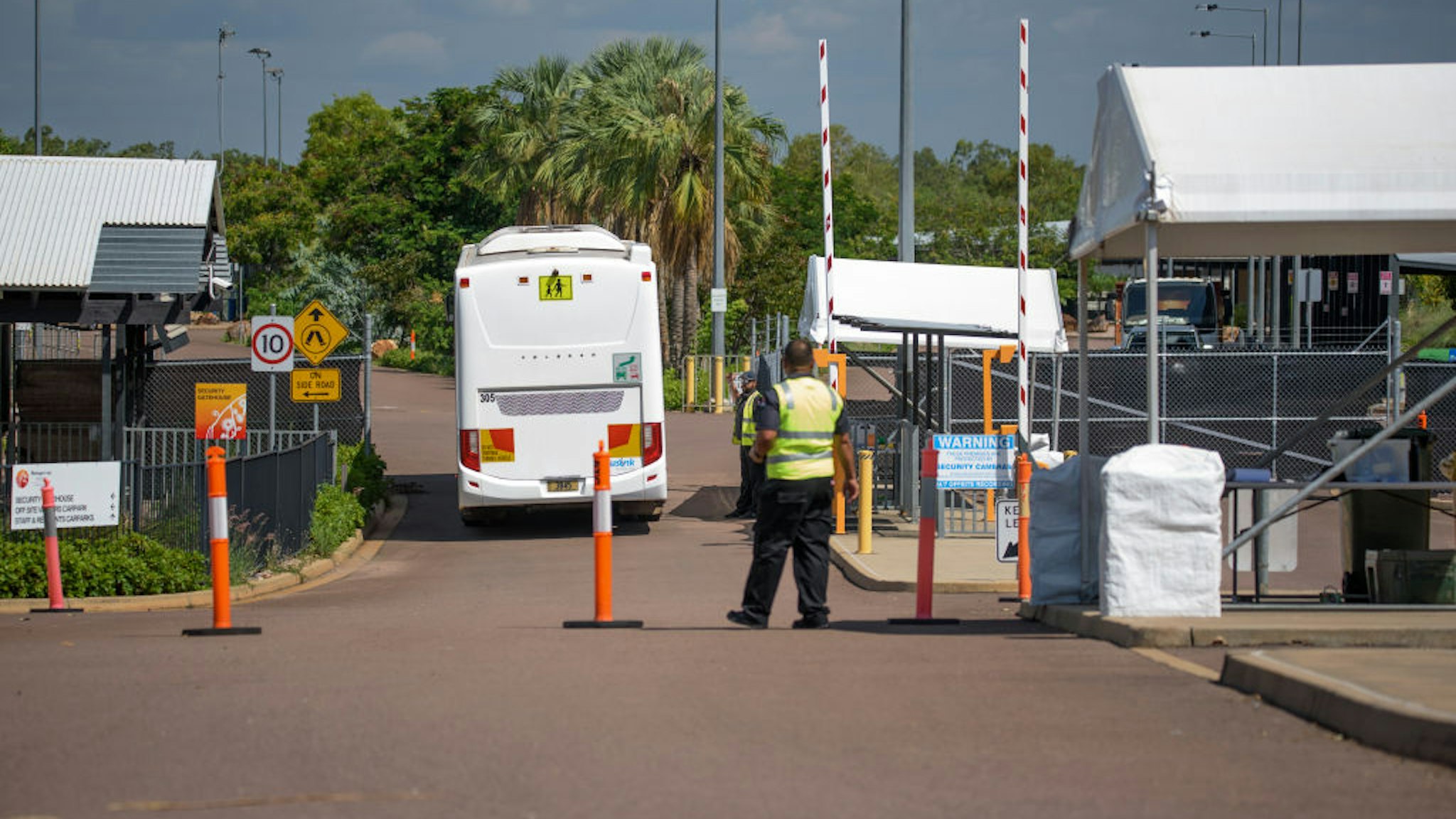 Passengers from Qantas flight QF110 arrive at the Howard Springs Quarantine Facility on October 23, 2020 in Darwin, Australia.