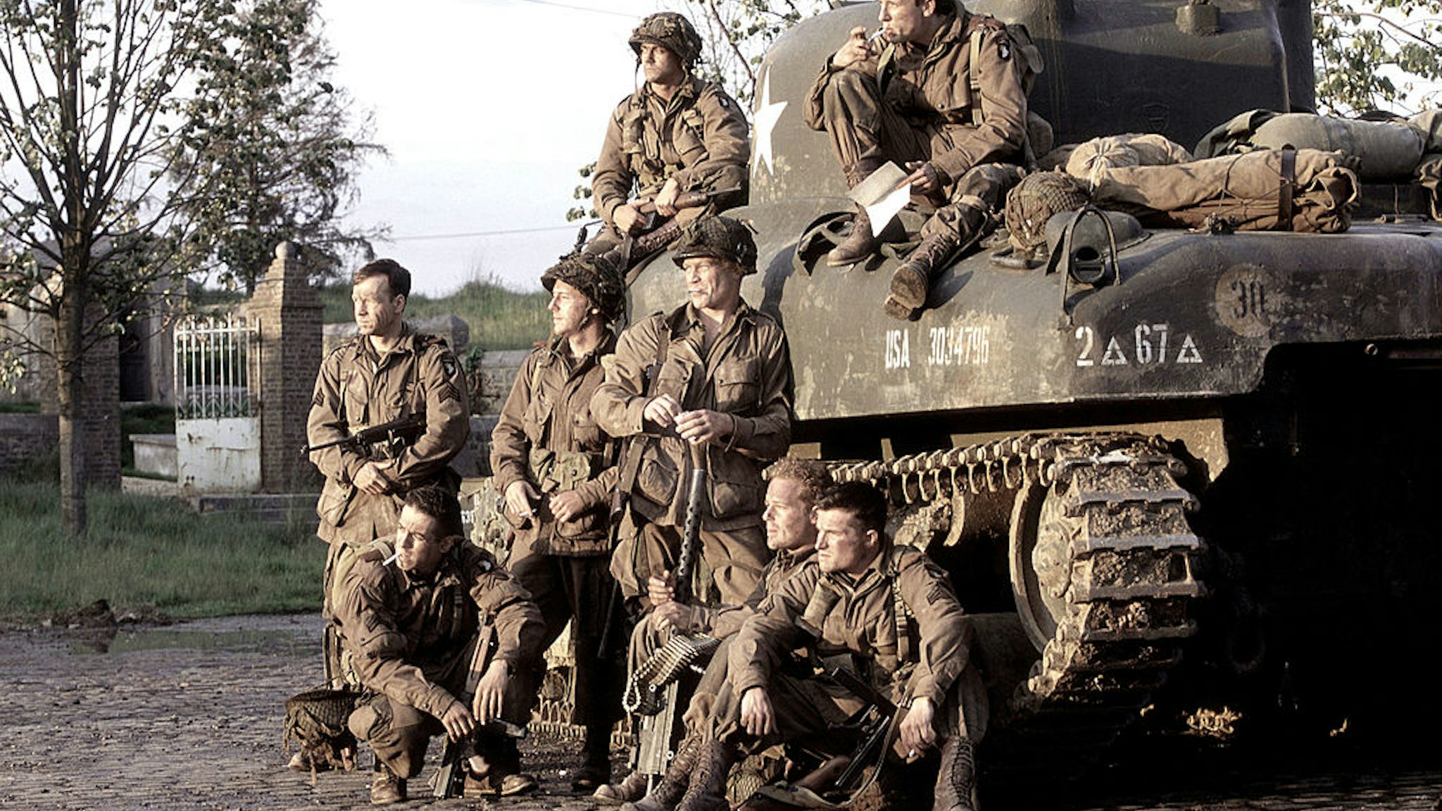 391254 11: The cast acts in a scene from HBO''s war mini-series "Band Of Brothers." (Top row from L to R) Phillip Barantini (as Sisk) and Ross McCall (as Leibgott). (Bottom row from L to R) Scott Grimes (as Malarkey), Donnie Wahlberg (as Carwood Lipton), Kirk Acevedo (as Joe Toye), Neal McDonough (as Lynn "Buck" Compton), Adam James (as Cleveland Petty) and Frank John Hughes (as Sgt. Bill Guamere). (Photo by HBO via Getty Images)
