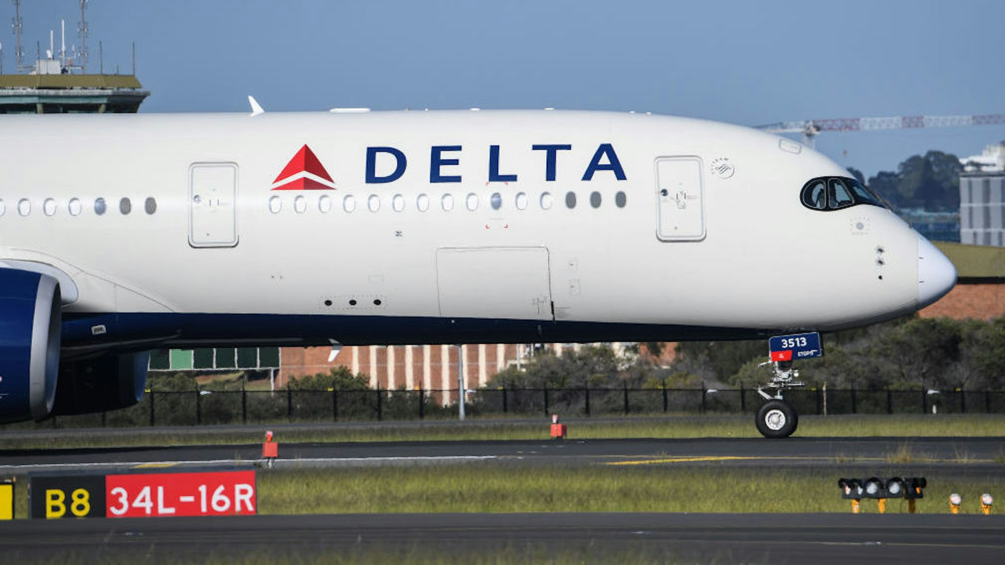 A Delta airlines aircraft landing from Los Angeles at Kingsford Smith International airport on October 31, 2021 in Sydney, Australia.
