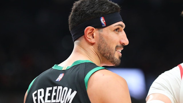PORTLAND, OREGON - DECEMBER 04: Enes Freedom #13 of the Boston Celtics, formerly known as Enes Kanter, looks on during the third quarter against the Portland Trail Blazers at Moda Center on December 04, 2021 in Portland, Oregon. NOTE TO USER: User expressly acknowledges and agrees that, by downloading and or using this photograph, User is consenting to the terms and conditions of the Getty Images License Agreement. (Photo by Abbie Parr/Getty Images)