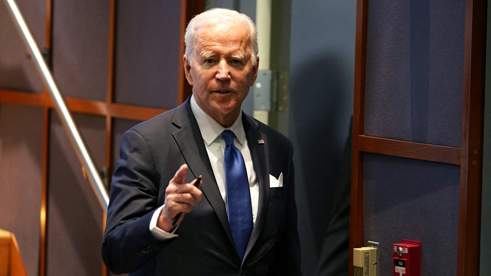 US President Joe Biden answers a question about the government shutdown after speaking about the administrations response to Covid-19 and the Omicron variant at the National Institutes of Health (NIH) in Bethesda, Maryland on December 2, 2021.