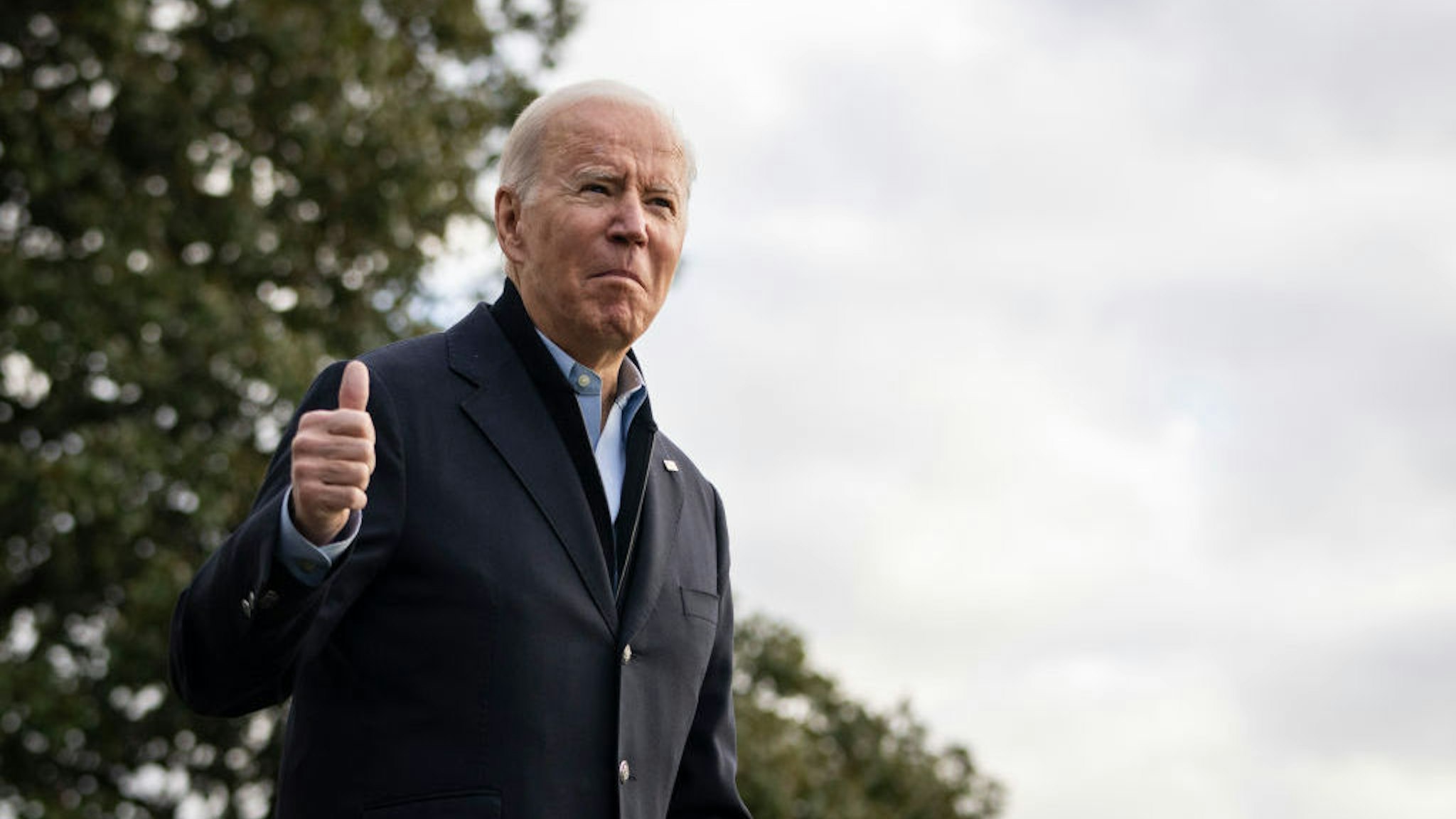 WASHINGTON, DC - DECEMBER 15: U.S. President Joe Biden gives a thumbs up after speaking to reporters as he walks to Marine One on the South Lawn of the White House December 15, 2021 in Washington, DC. President Biden is traveling to Kentucky on Wednesday, where he will visit some of the towns hit hardest by the recent deadly tornados that struck the region. (Photo by Drew Angerer/Getty Images)