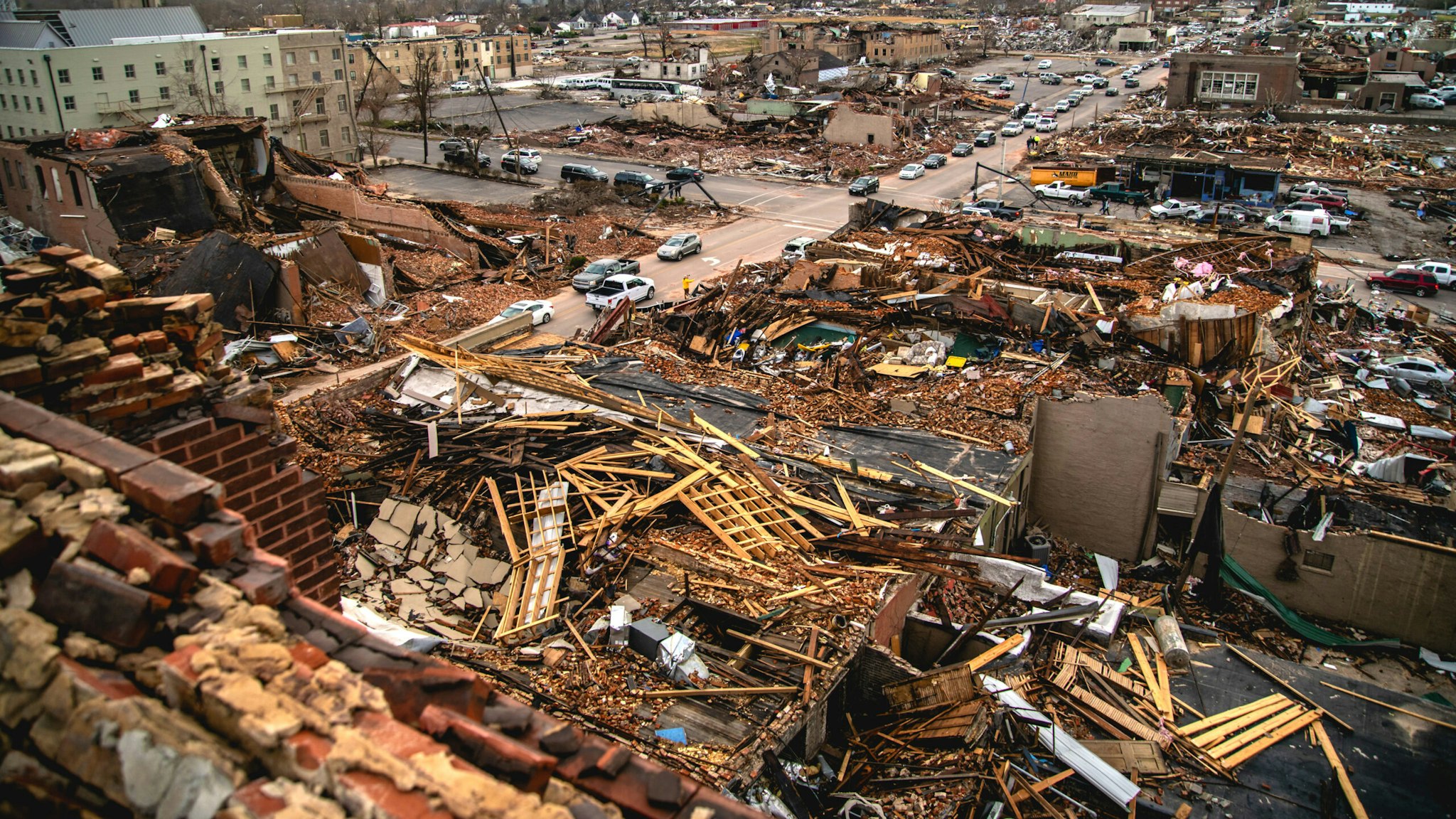 Damaged buildings following a tornado in Mayfield, Kentucky, U.S., on Saturday, Dec. 11, 2021. Tornadoes ripped across several U.S. states late Friday, killing more than 70 people in Kentucky, at least two at a nursing home in Arkansas and an undetermined number at an Amazon.com warehouse that was partially flattened in Illinois.