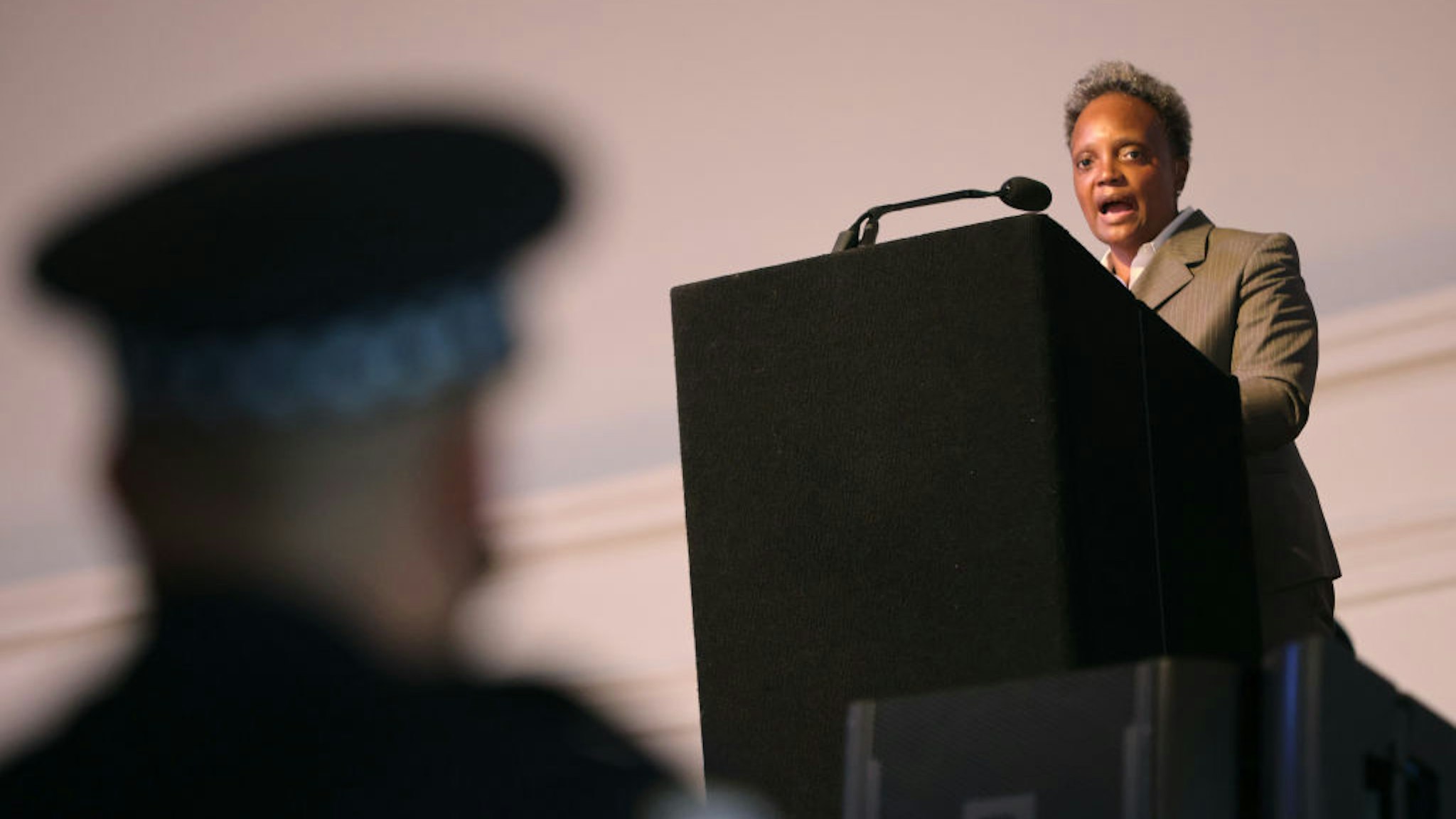Chicago Mayor Lori Lightfoot speaks at a Chicago Police Department promotion and graduation ceremony on October 20, 2021 in Chicago, Illinois. The mayor has been sparring with the union that represents Chicago police after the city ordered police to state their COVID-19 vaccination status. With only about 65 percent of the city's police in compliance the city has started to place those who have not on unpaid leave. (Photo by Scott Olson/Getty Images)