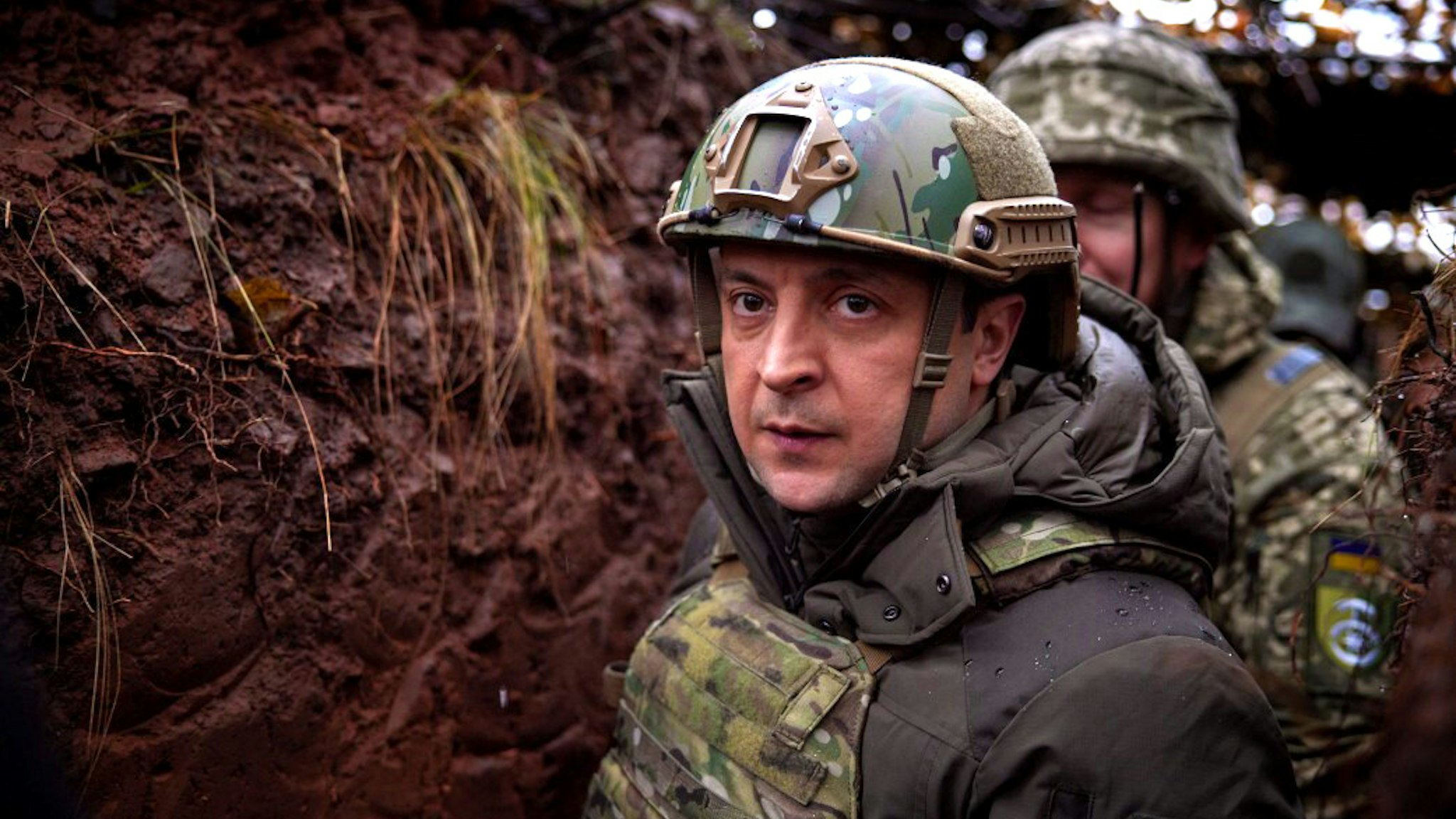 DONBASS, UKRAINE - DECEMBER 06: (----EDITORIAL USE ONLY â MANDATORY CREDIT - "UKRAINIAN PRESIDENCY / HANDOUT" - NO MARKETING NO ADVERTISING CAMPAIGNS - DISTRIBUTED AS A SERVICE TO CLIENTS----) Ukrainian President Volodymyr Zelensky visits the front-line positions of Ukrainian military in Donbass, Ukraine on December 06, 2021.