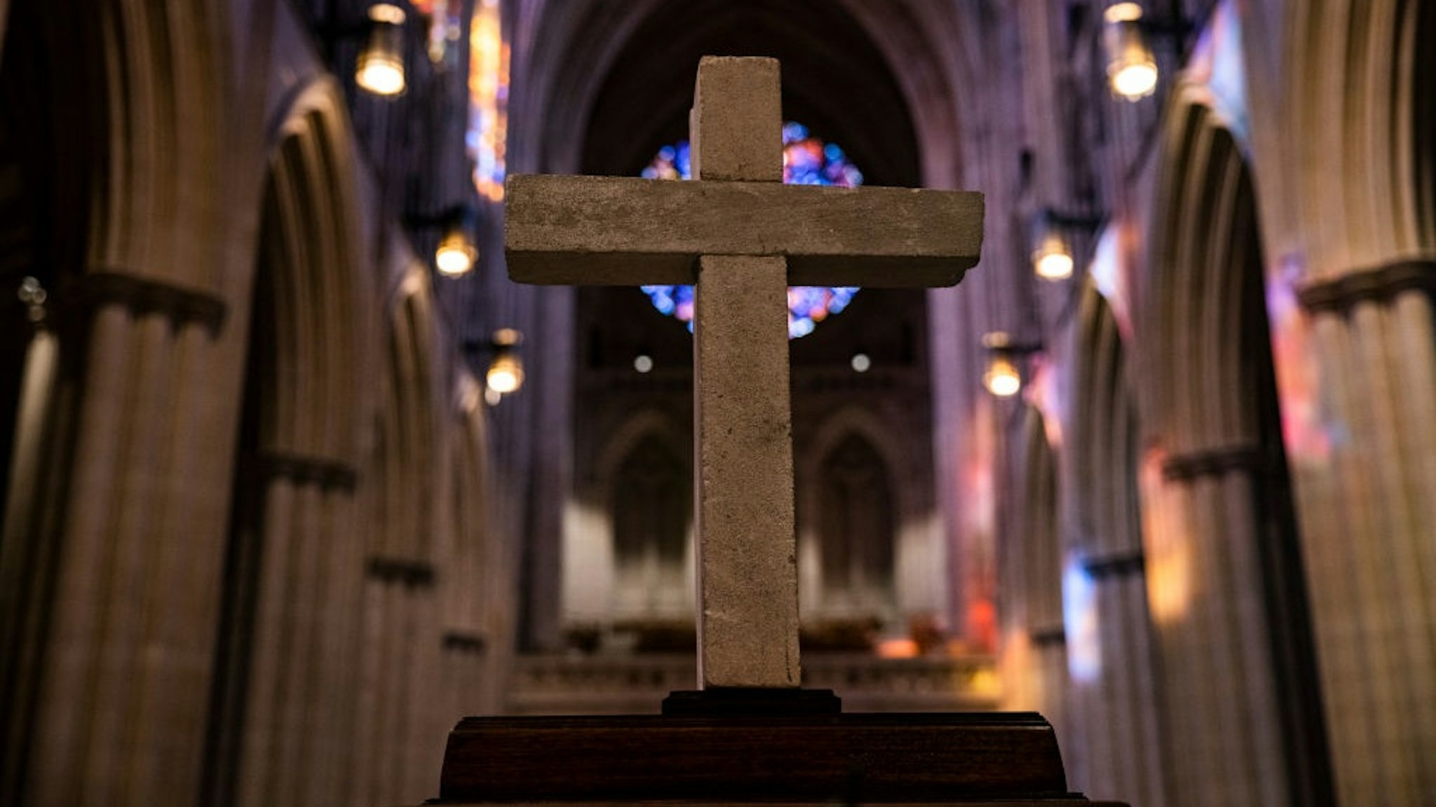 WASHINGTON, DC - SEPTEMBER 12: A piece of rubble in the shape of a cross that was pulled from the rubble at the Pentagon in the 9/11 terrorist attacks sits in the nave of the Washington National Cathedral on September 12, 2021 in Washington, DC.