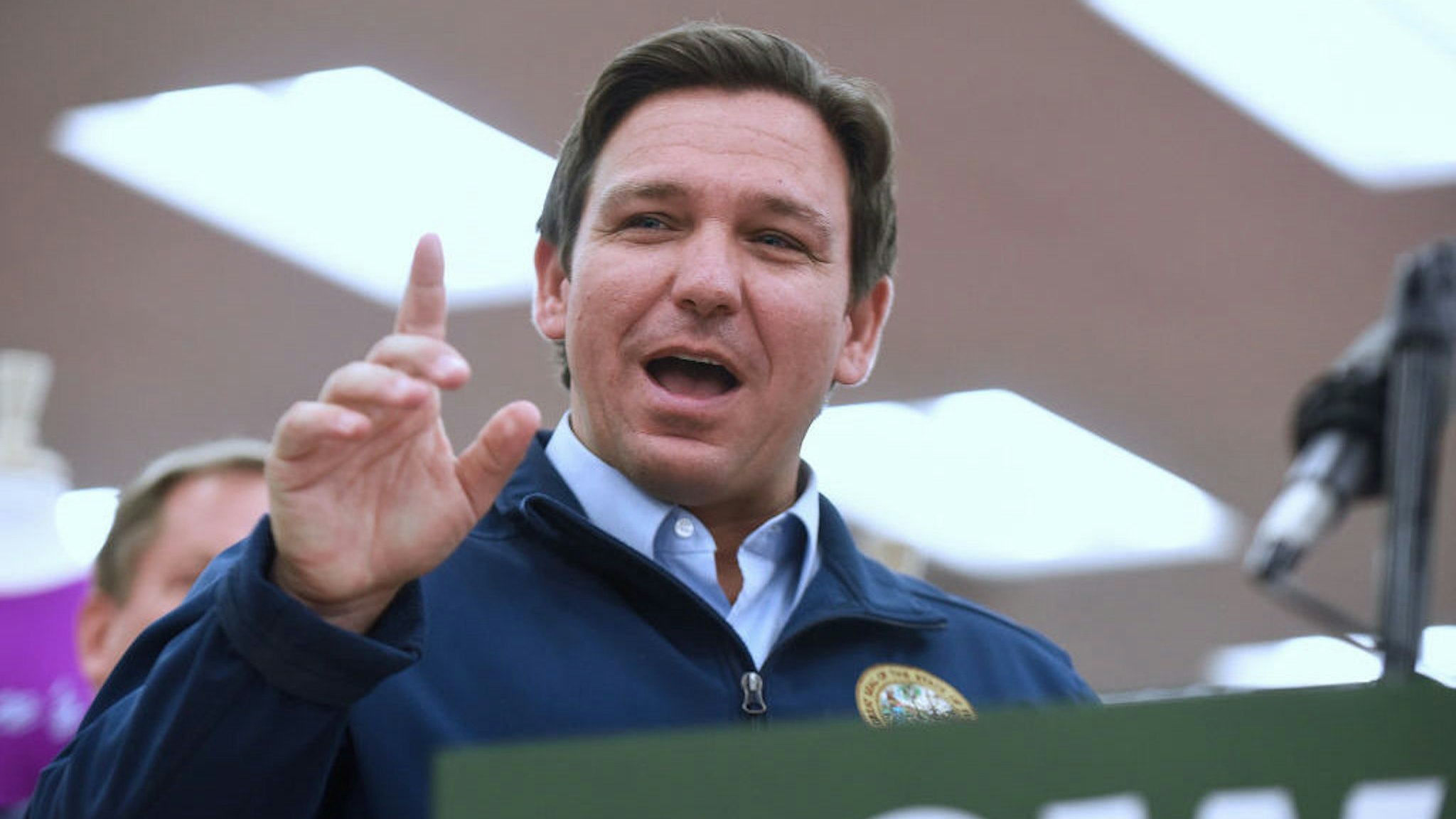 DAYTONA BEACH, FLORIDA, UNITED STATES - 2021/11/22: Florida Gov. Ron DeSantis speaks at a press conference at Buc-ee's travel center, where he announced his proposal of more than $1 billion in gas tax relief for Floridians in response to rising gas prices caused by inflation. DeSantis is proposing to the Florida legislature a five-month gas tax holiday. (Photo by Paul Hennessy/SOPA Images/LightRocket via Getty Images)