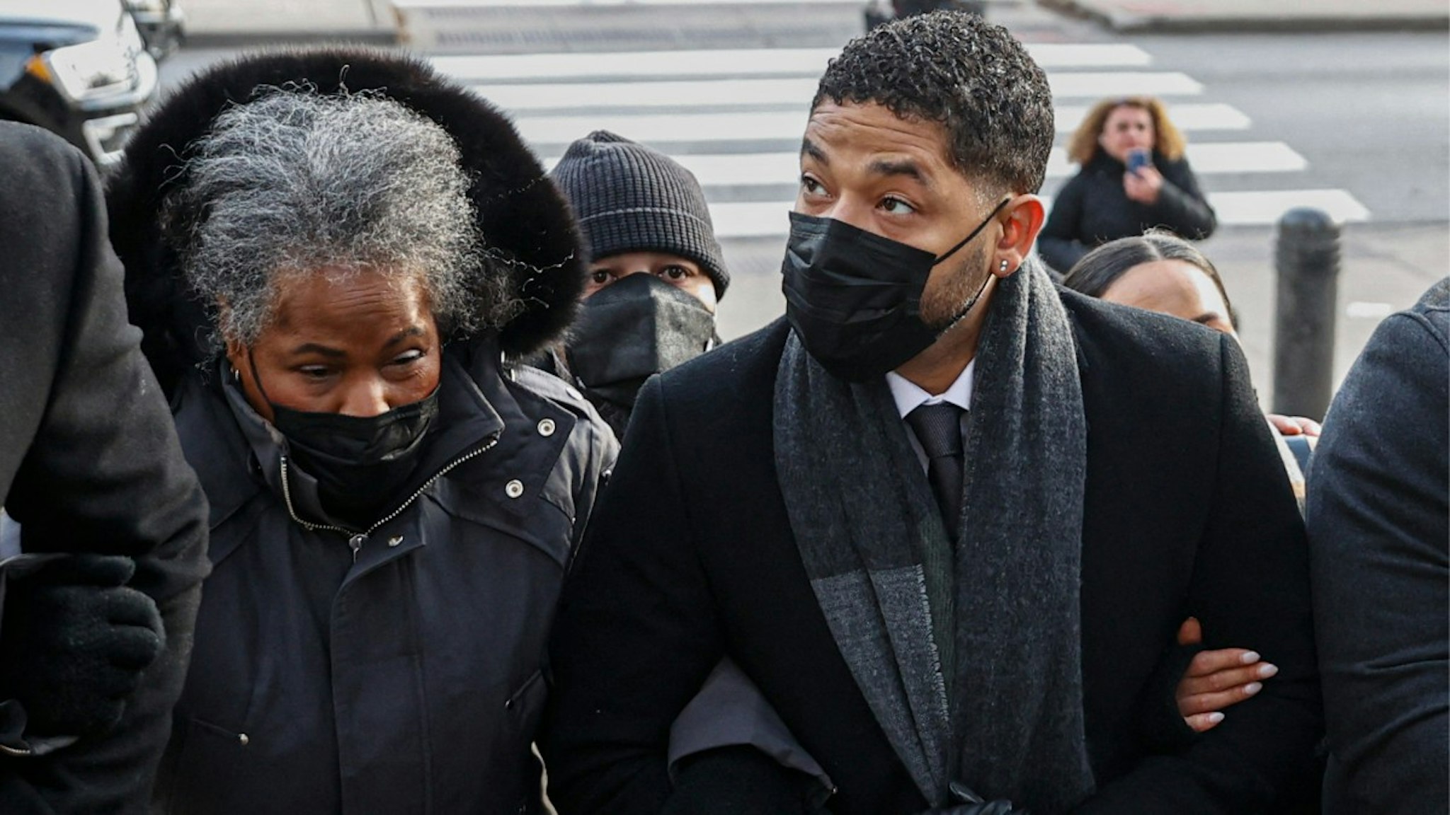 Jussie Smollett arrives with his mother Janet Smollett at the Leighton Criminal Court Building for his trial on disorderly conduct charges on December 7 2021 in Chicago, Illinois. -