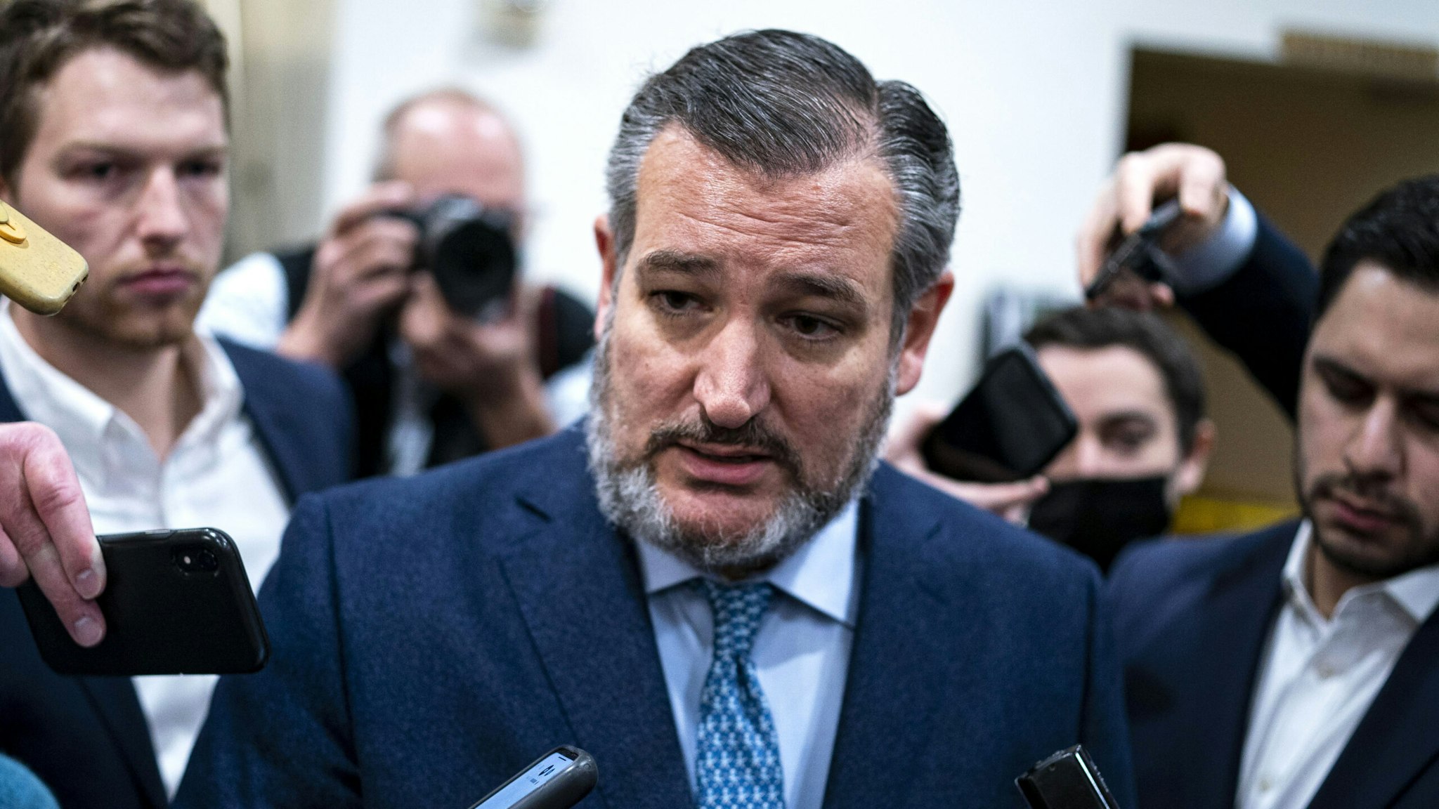 Senator Ted Cruz, a Republican from Texas, speaks with members of the media while arriving for a vote in the U.S. Capitol in Washington, D.C., U.S., on Thursday, Dec. 2, 2021. House Democrats released a bipartisan short-term spending bill to keep the government open after midnight Friday and plan to put it to a House vote later today.